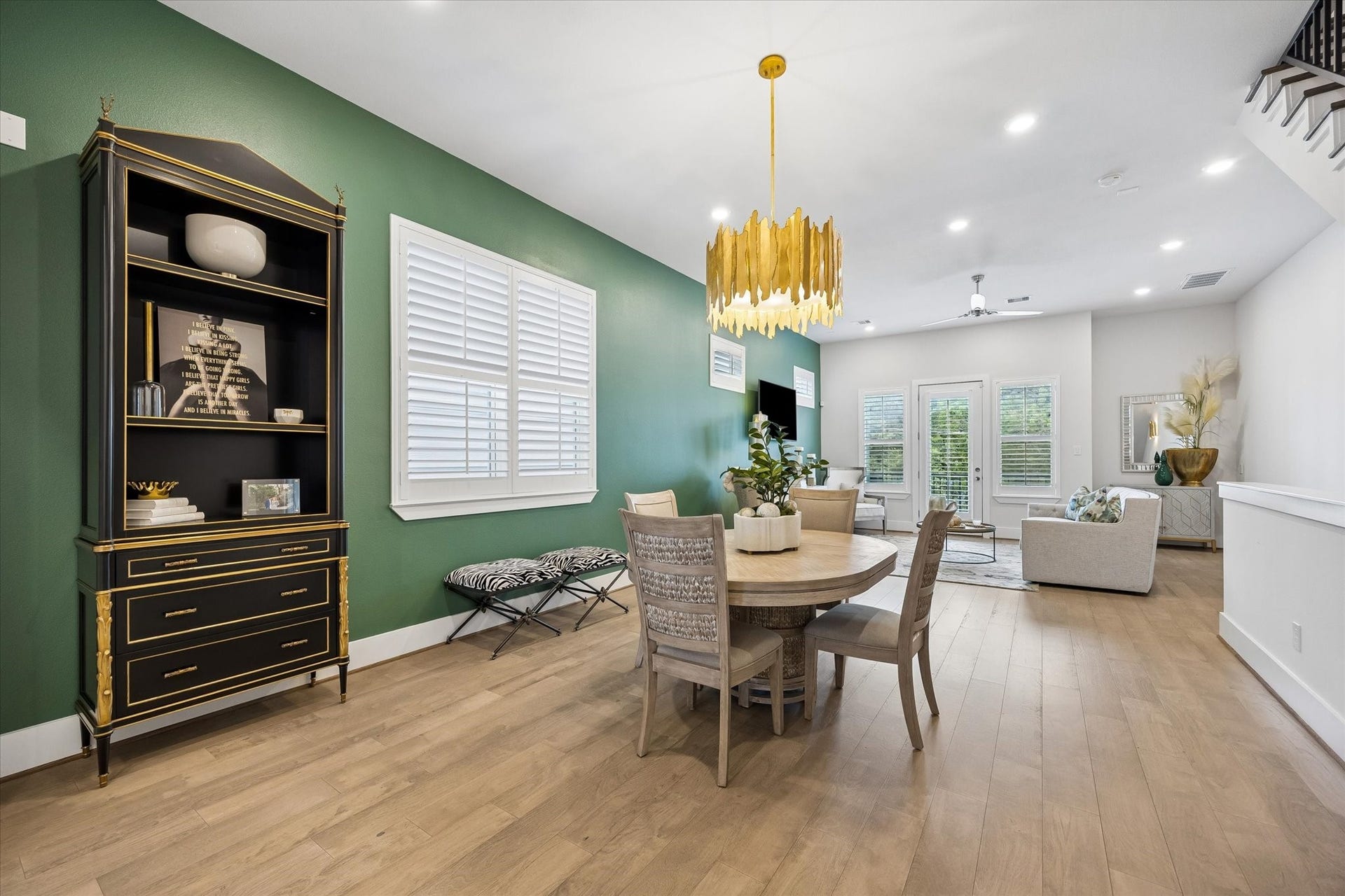 1226 W 21st Street, Houston, TX 77008 The open main floor layout makes everyday living feel effortless, with the dining area connecting naturally to the living room, balcony access, and island kitchen.