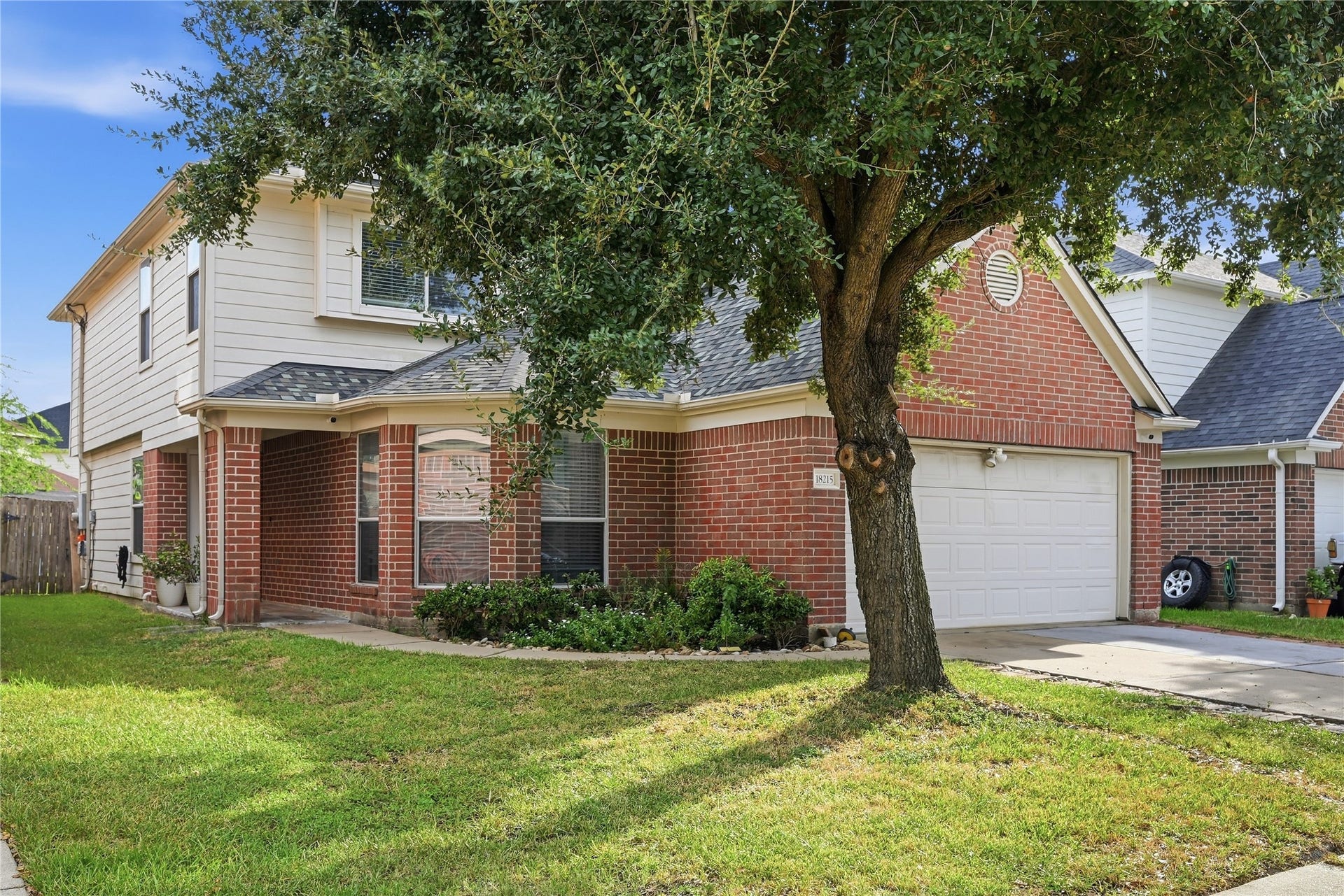 18215 Echo Mar Lane, Houston, TX 77084 In this angle you can see the walkway that leads to the front of the home.