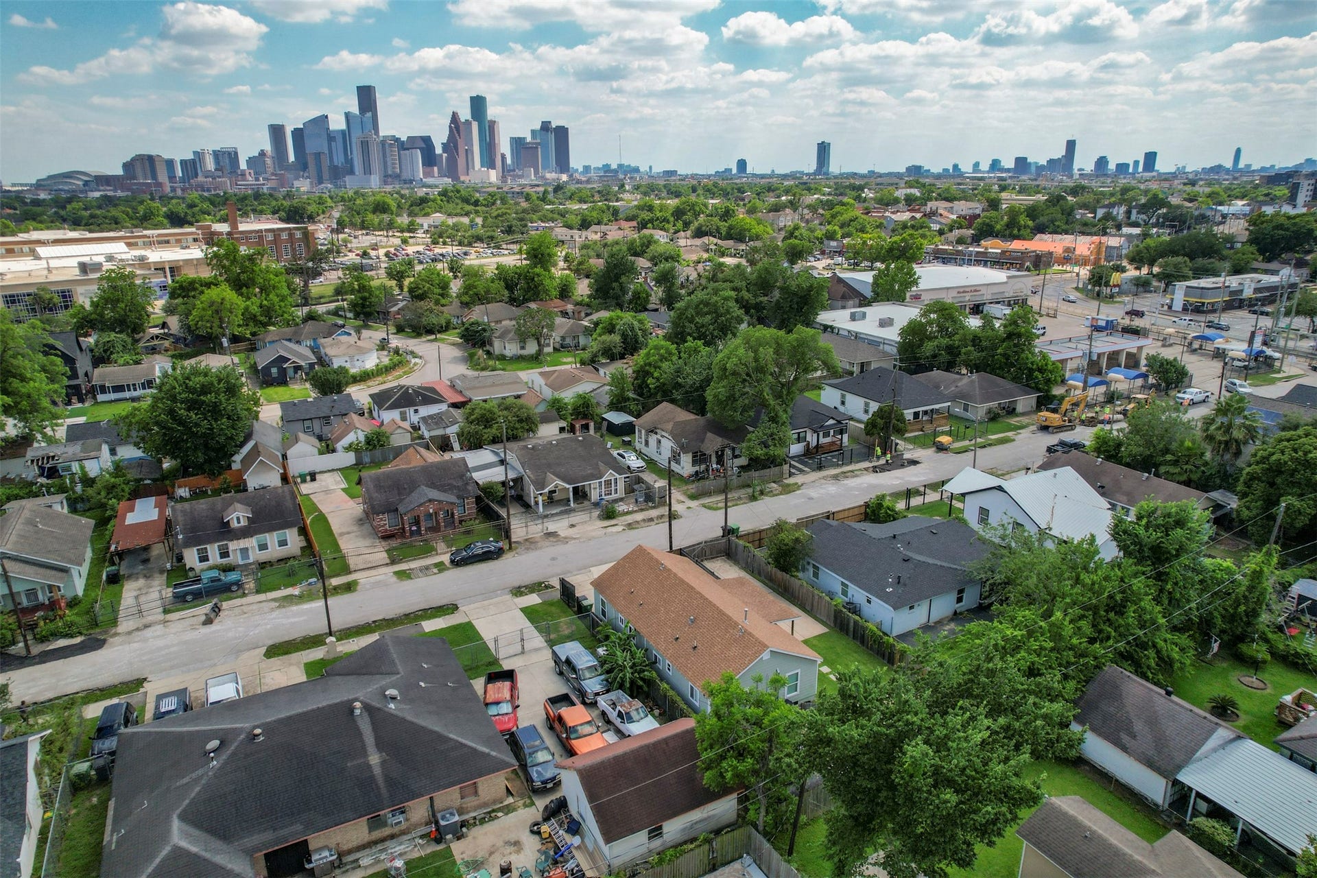 1121 Panama Street, #B, Houston, TX 77009 Wide aerial showcasing the Near Northside neighborhood with unobstructed Downtown Houston skyline views, demonstrating the property's prime urban location and strong appreciation corridor.