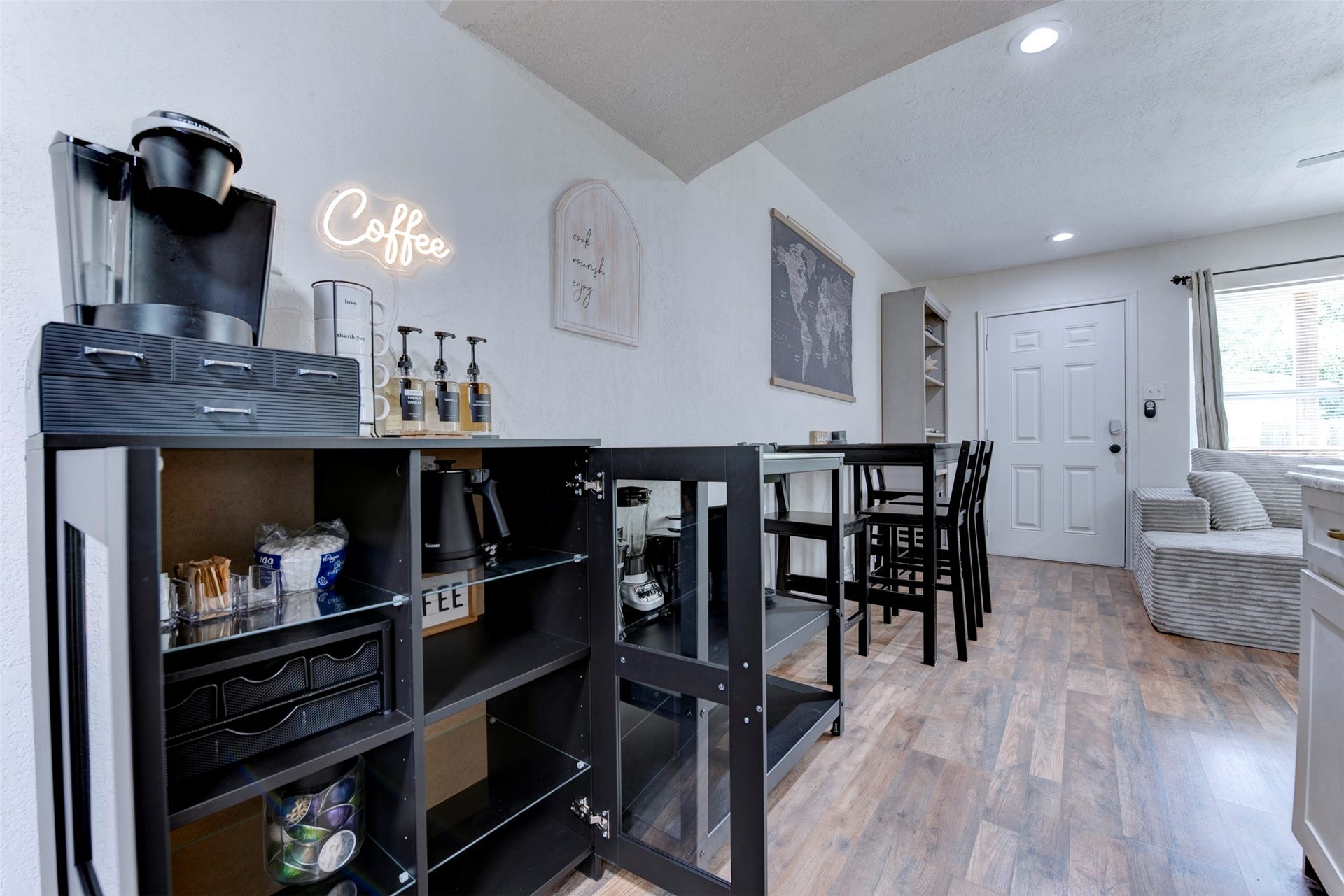 1121 Panama Street, #B, Houston, TX 77009 Dining area with bar-height seating, dedicated coffee station, recessed lighting, and smart lock entry