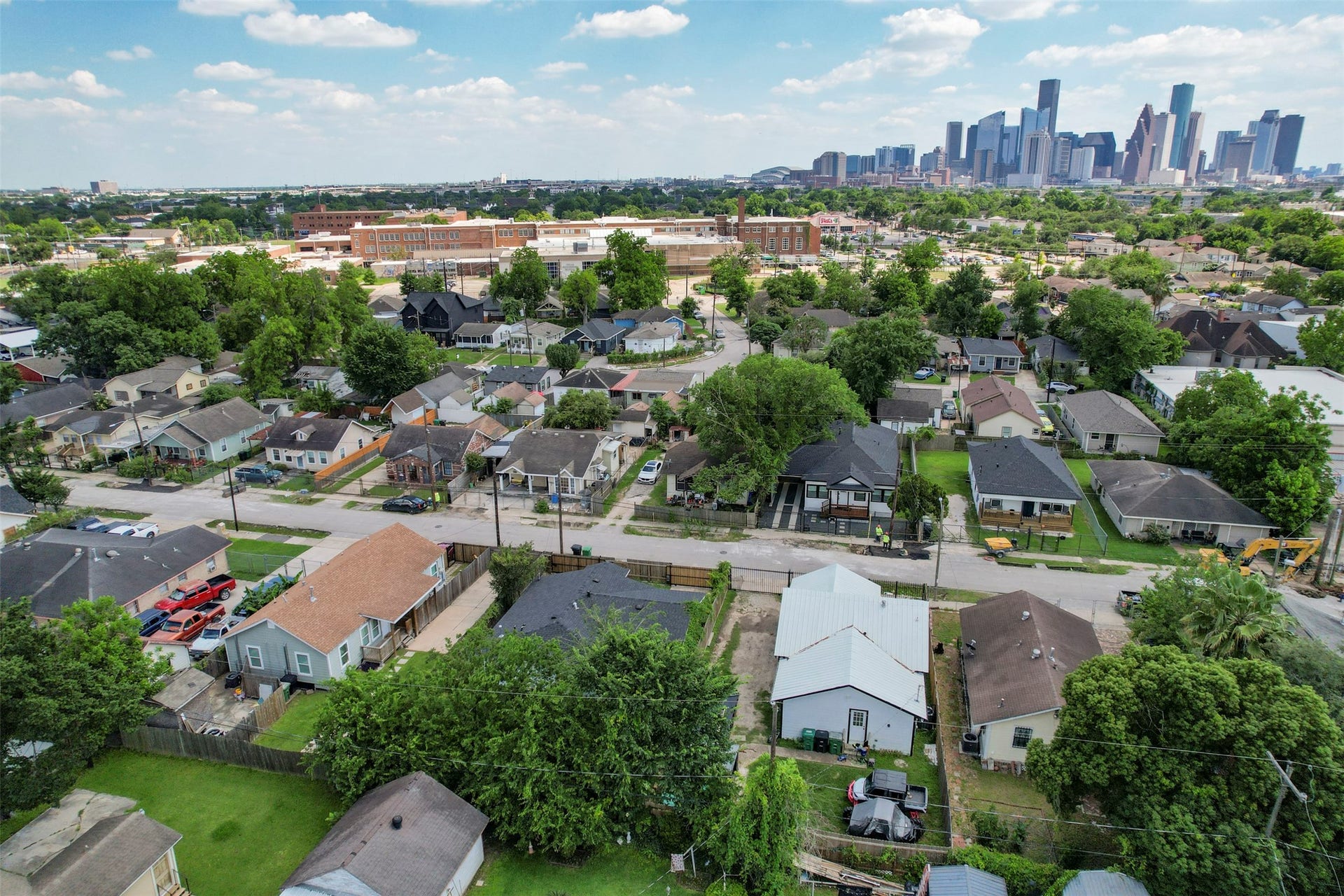 1121 Panama Street, #B, Houston, TX 77009 Aerial view showcasing the Near Northside neighborhood with the full Downtown Houston skyline visible, highlighting active new construction and reinvestment happening throughout the corridor.