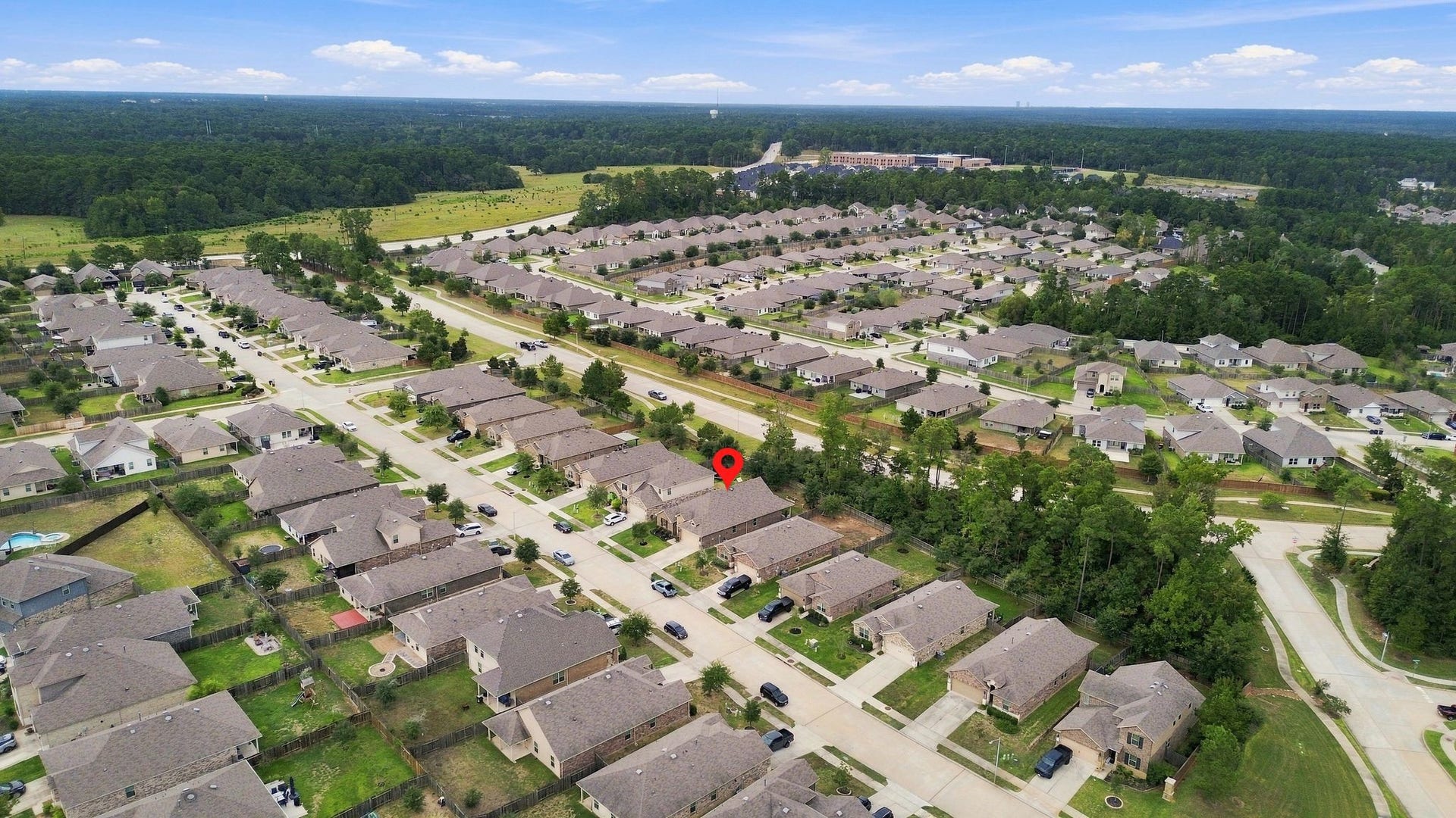 11371 Dawn Beach Lane, Conroe, TX 77304 Nestled in a peaceful, tree-lined neighborhood, this home offers convenient access to well-maintained roads and nearby amenities, providing a harmonious blend of suburban charm and practicality.