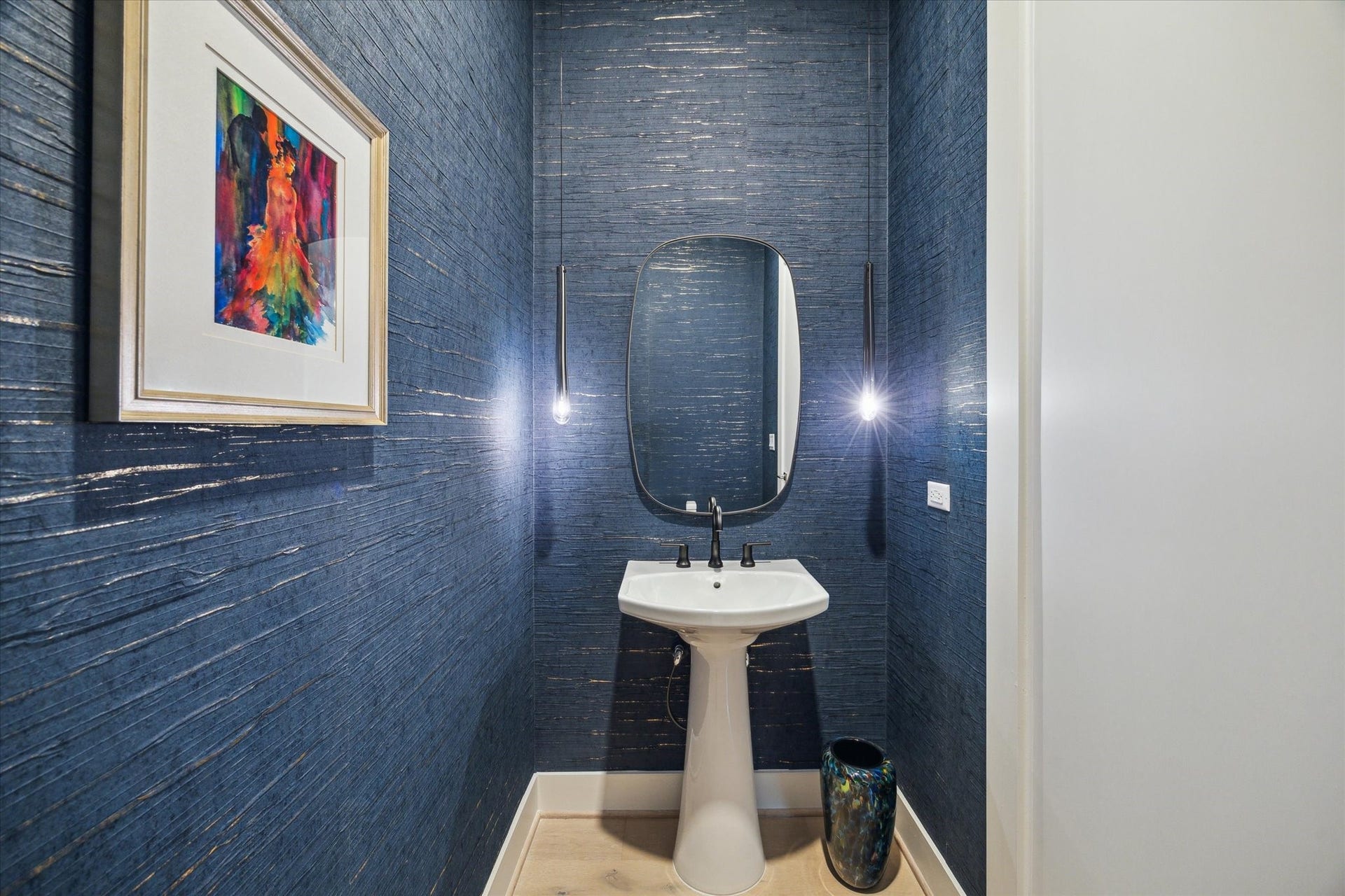 1711 Allen Parkway, #2601, Houston, TX 77019 Half bath with luxurious wallcovering and pendant lighting.
