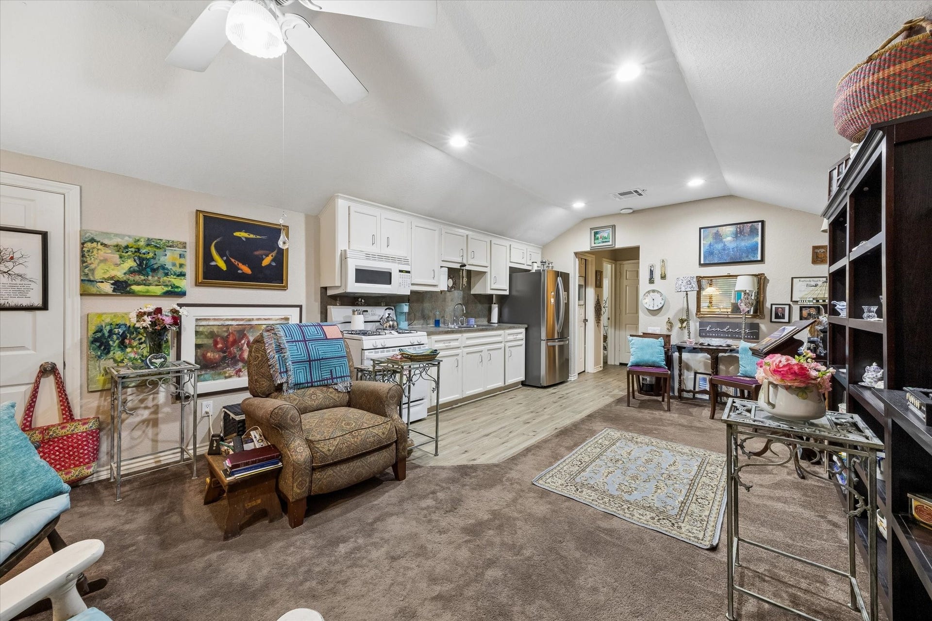 3040 Bayshore Drive, Bacliff, TX 77518 Private upstairs garage apartment featuring a full kitchen, living area, and vaulted ceiling. Ideal for guests, extended living, or potential rental income with a self-contained layout.
