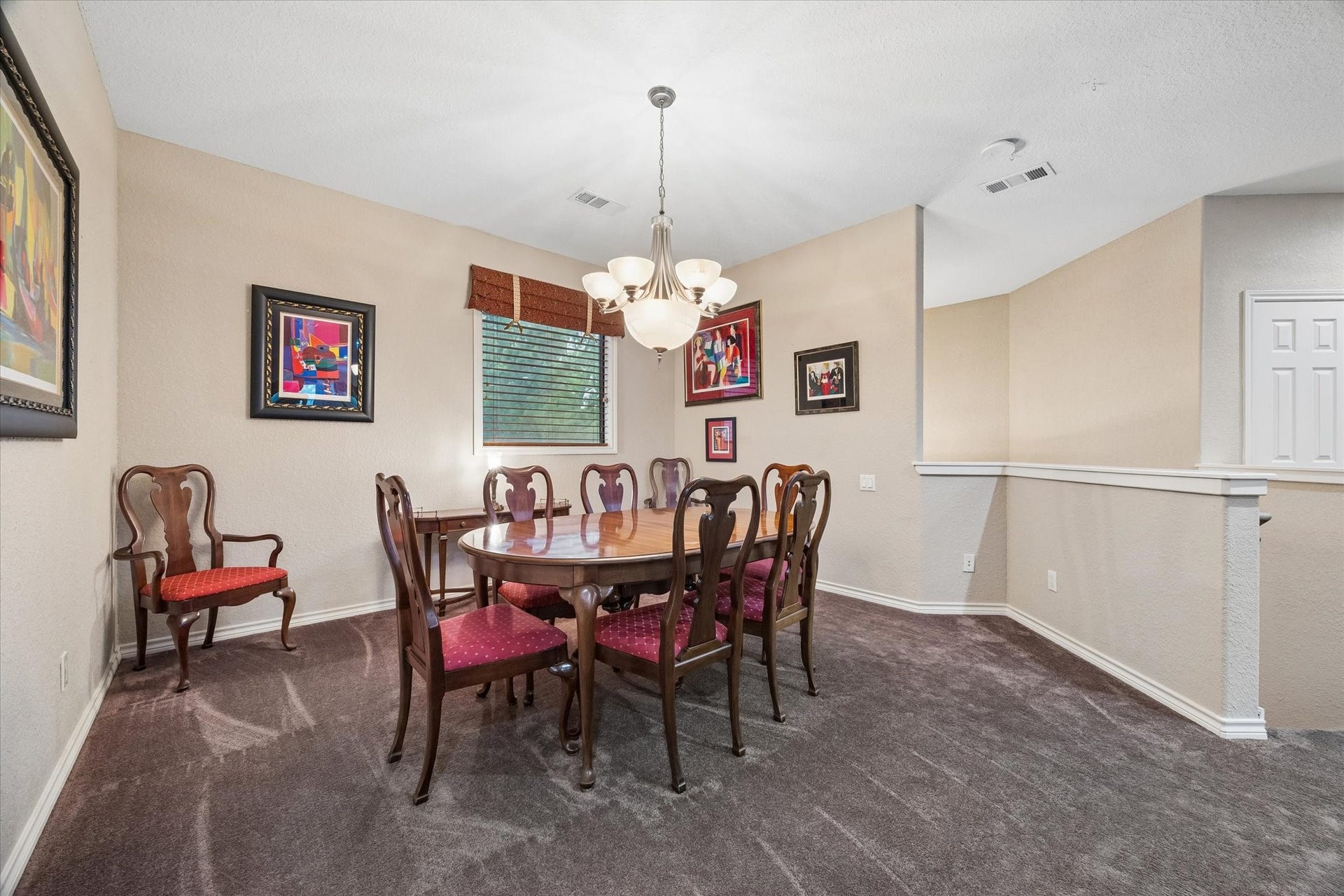 3040 Bayshore Drive, Bacliff, TX 77518 Dedicated dining area with overhead lighting, offering ample space for a full-size table and seating. Open to the main living area, ideal for both everyday dining and entertaining.