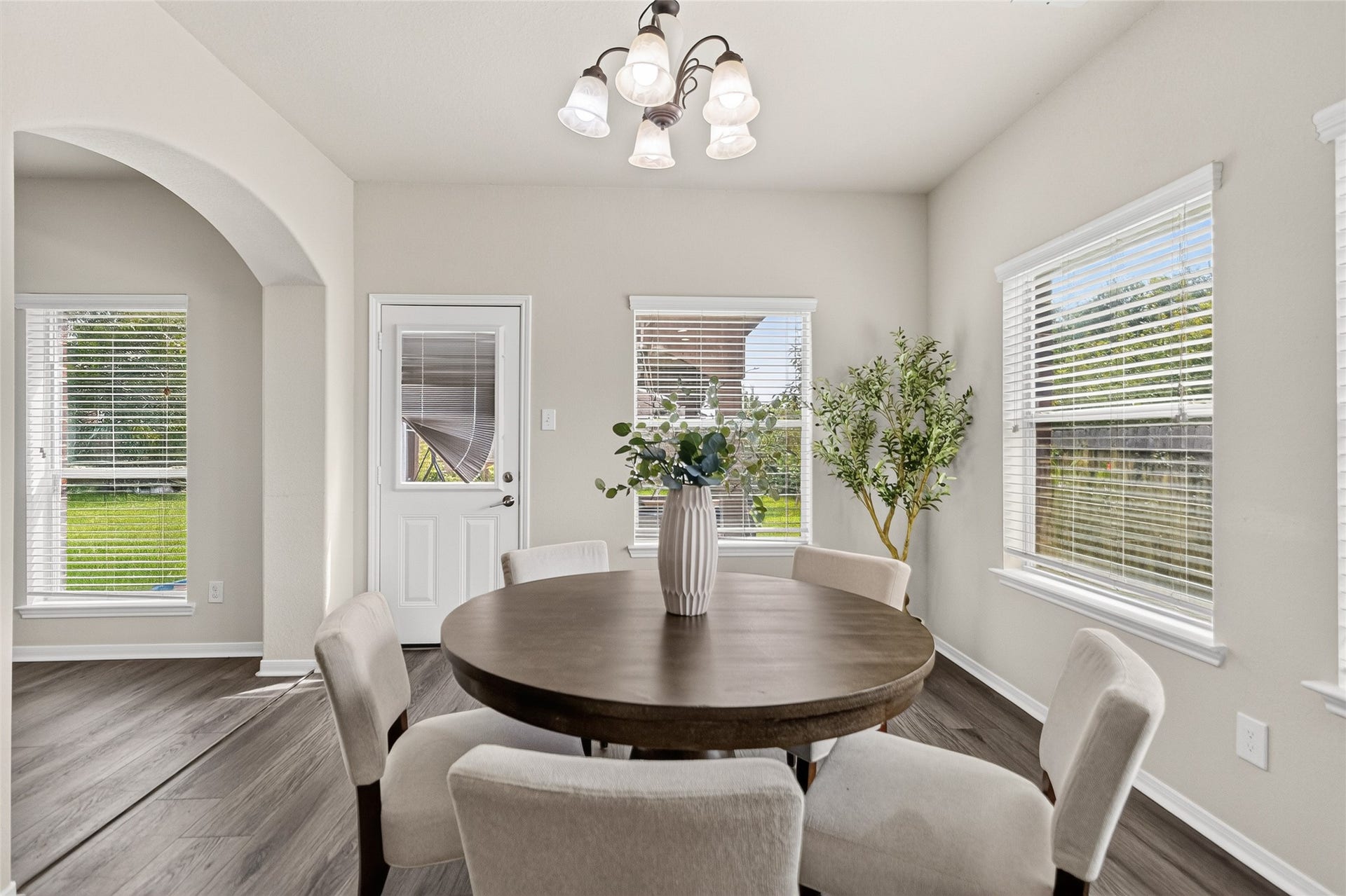 1231 Abigail Lane, Friendswood, TX 77546 Morning coffee feels even better in the bright breakfast nook, where backyard views and natural light create the perfect start to your day.