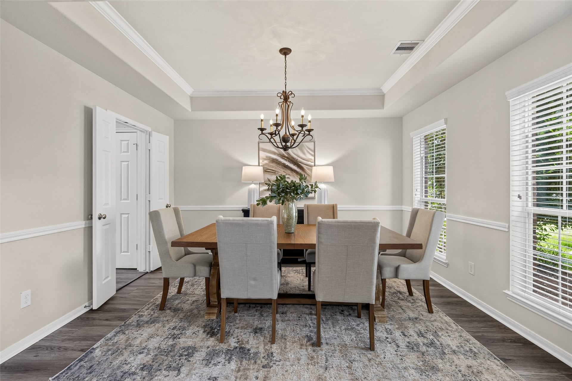 1231 Abigail Lane, Friendswood, TX 77546 Your formal dining room is ready for holiday gatherings and dinner parties, complete with a tray ceiling, chandelier, and plenty of space for family and friends.