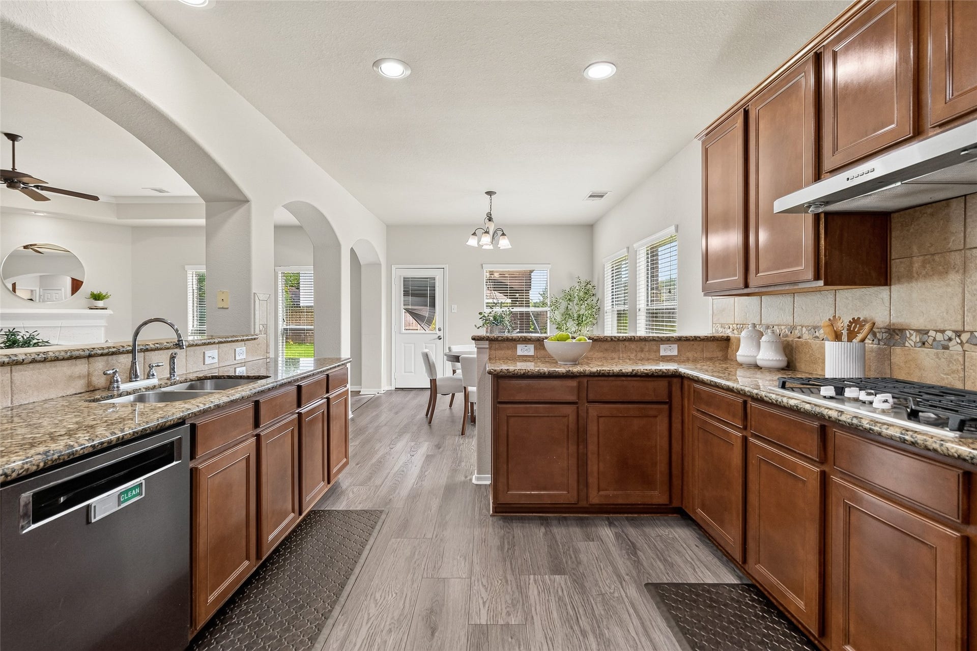 1231 Abigail Lane, Friendswood, TX 77546 Cooking becomes a pleasure with expansive granite counters, a spacious island, ample storage, and an open design that keeps you connected to family and guests.