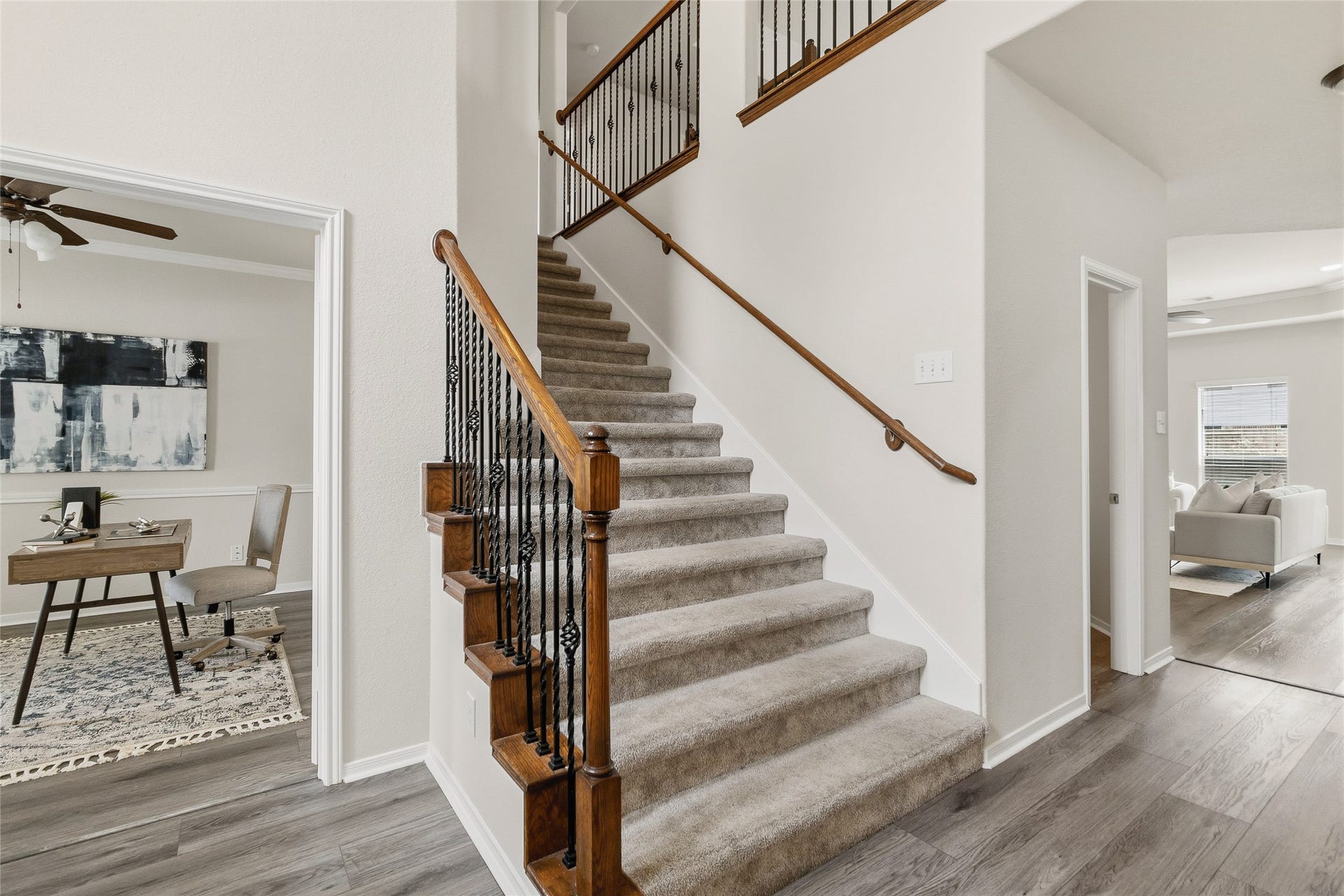 1231 Abigail Lane, Friendswood, TX 77546 Your sweeping staircase and open foyer make moving between levels feel effortless while adding timeless character to the heart of your home.
