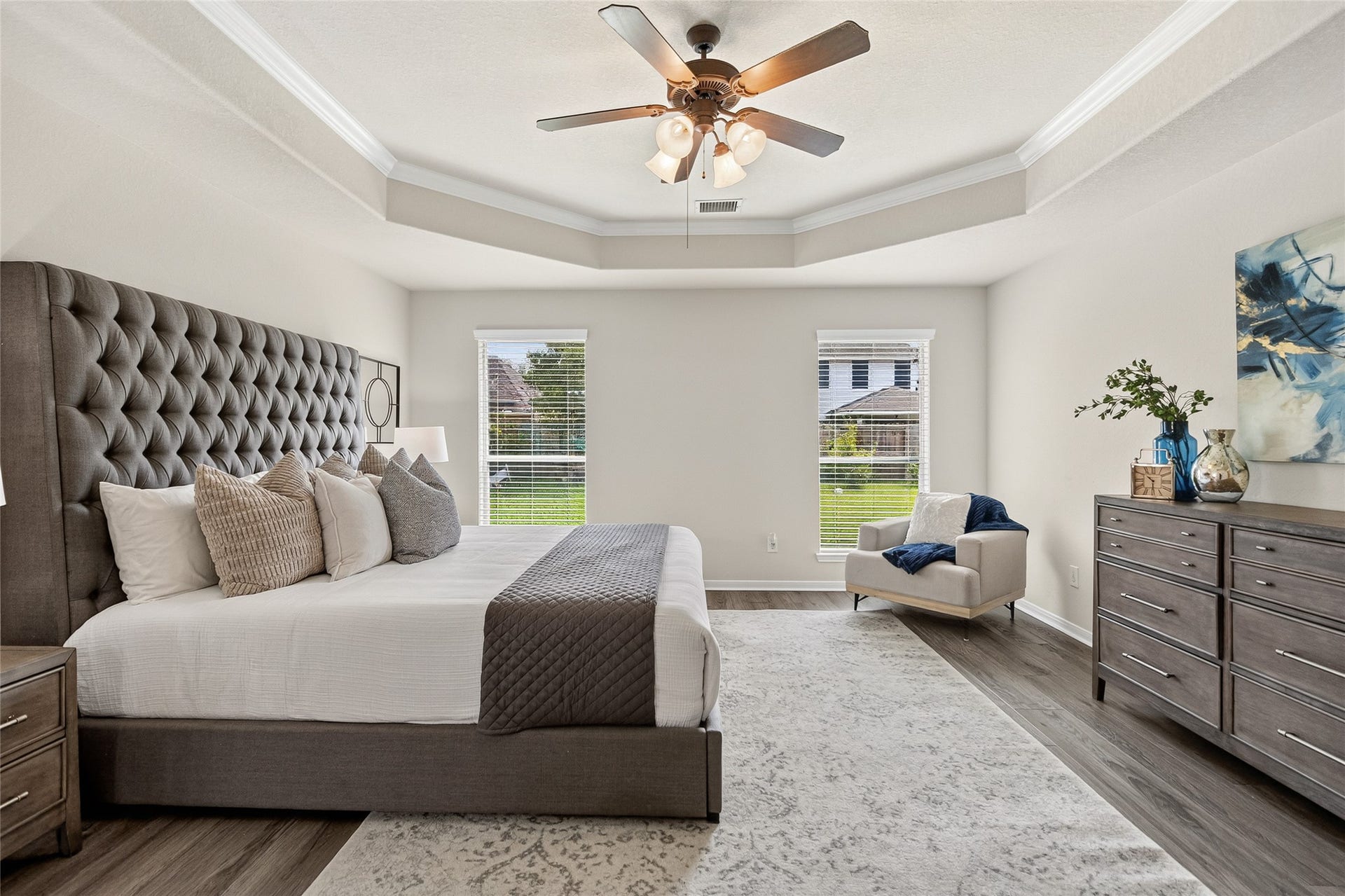 1231 Abigail Lane, Friendswood, TX 77546 Waking up feels refreshing in the oversized primary bedroom, where large windows, elegant finishes, and abundant space create a true owner's retreat.