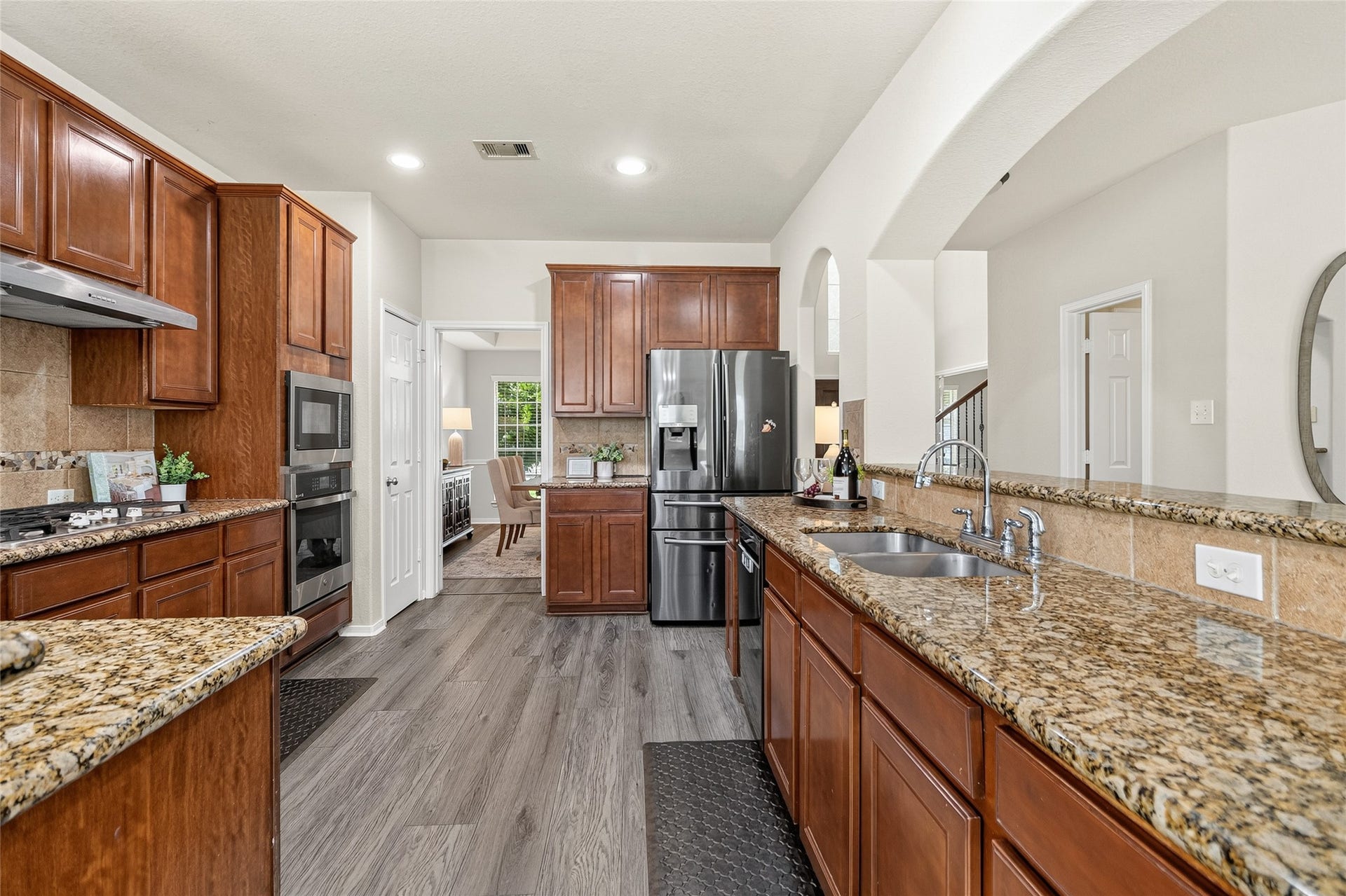 1231 Abigail Lane, Friendswood, TX 77546 Your chef-inspired kitchen features granite countertops, abundant cabinetry, stainless steel appliances, and generous prep space for everything from weeknight meals to holiday feasts.