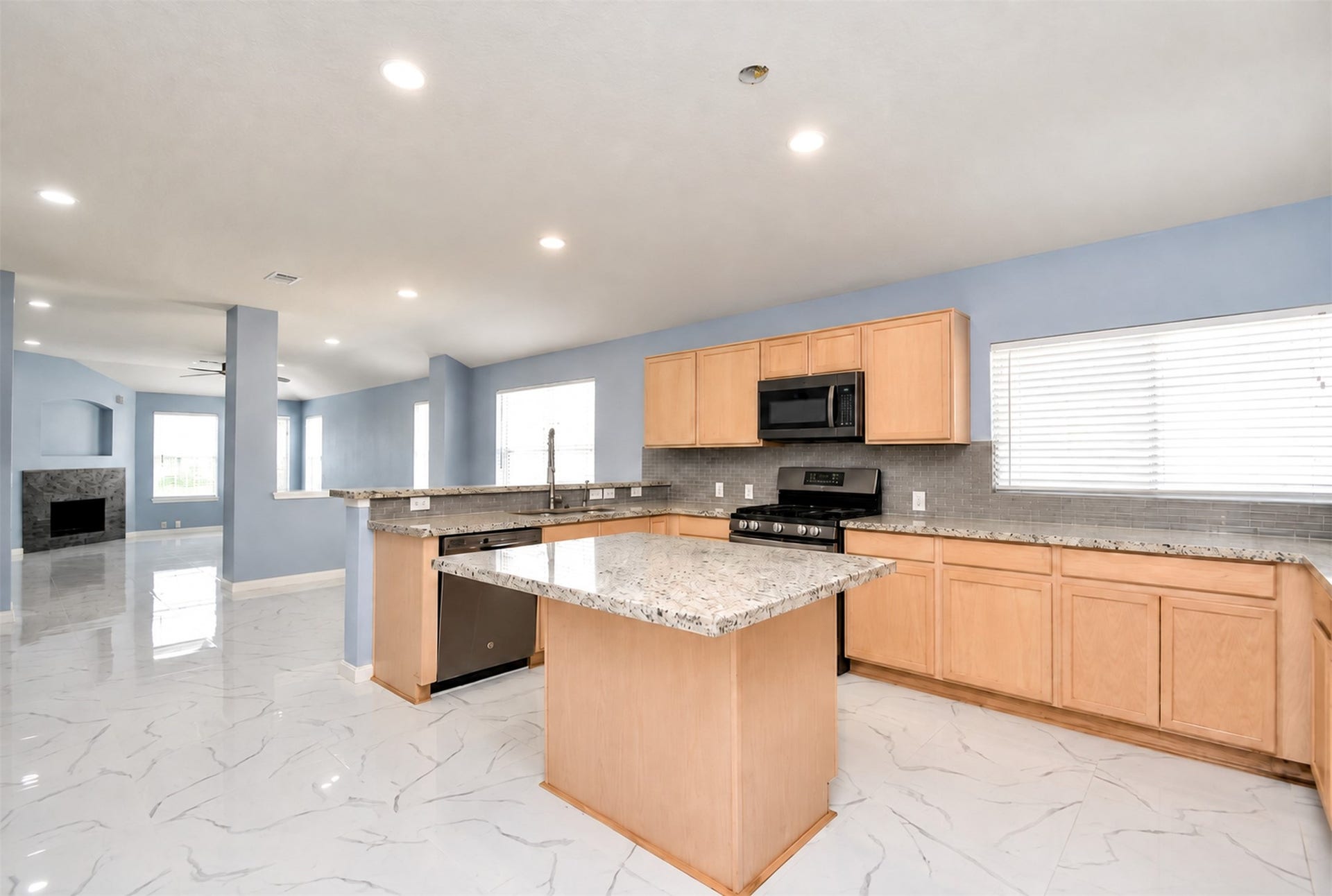 6003 Baldwin Elm Street, Richmond, TX 77407 Kitchen Area
***Property is vacant. Photo digitally enhanced with AI; lighting, color, and ceiling appearance adjusted. ***