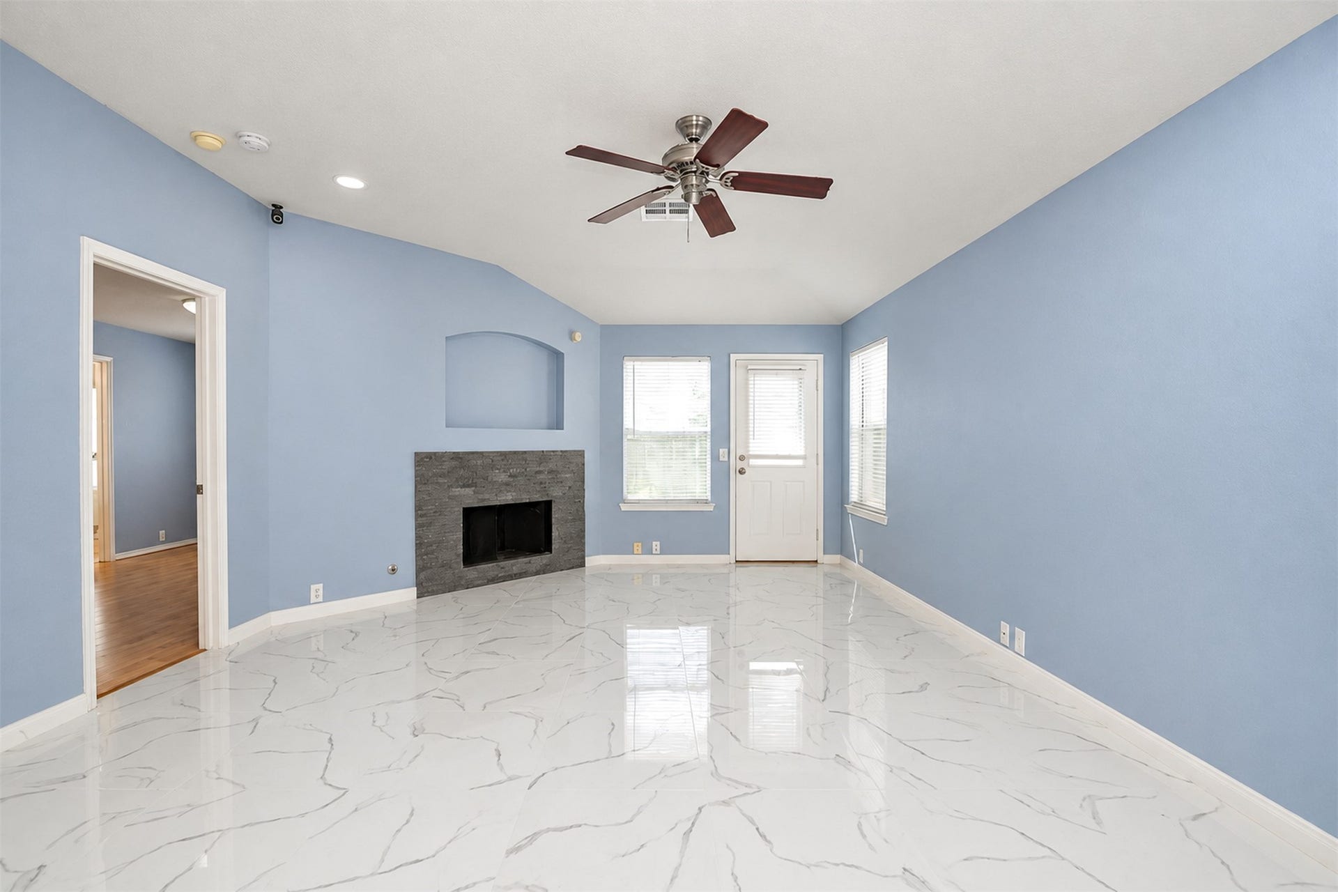 6003 Baldwin Elm Street, Richmond, TX 77407 Living Area
***Property is vacant. Photo digitally enhanced with AI; lighting, color, and ceiling appearance adjusted. ***