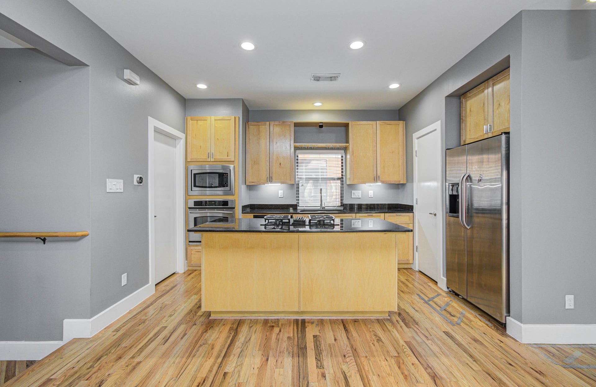 4410 Spencer Street, #A, Houston, TX 77007 Enjoy a beautiful open kitchen space with ample countertop and cabinet storage.