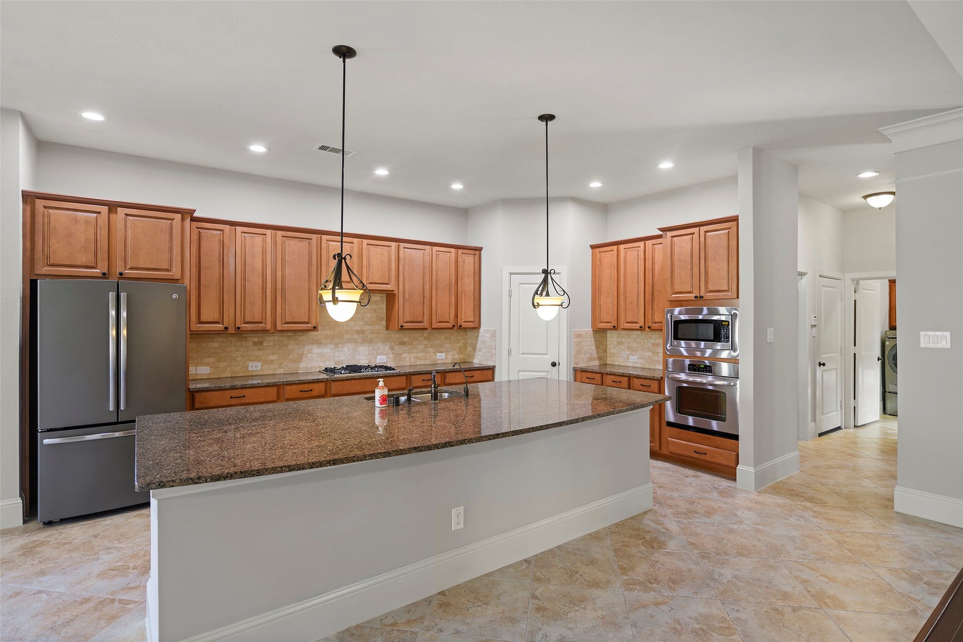 Tons of cabinet space and a walk-in pantry.  Refrigerator included.