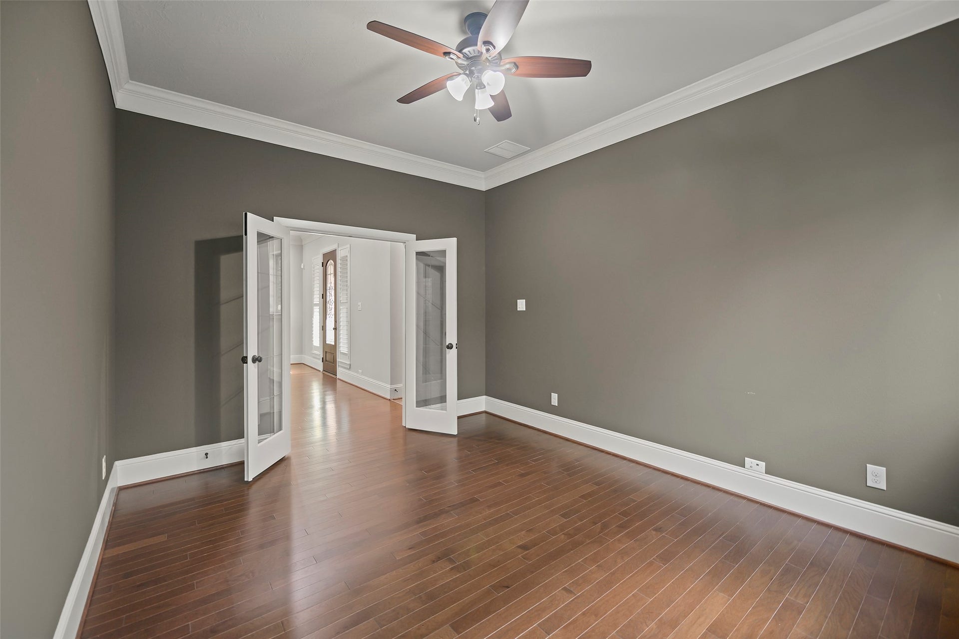 French doors lead you to the home office.