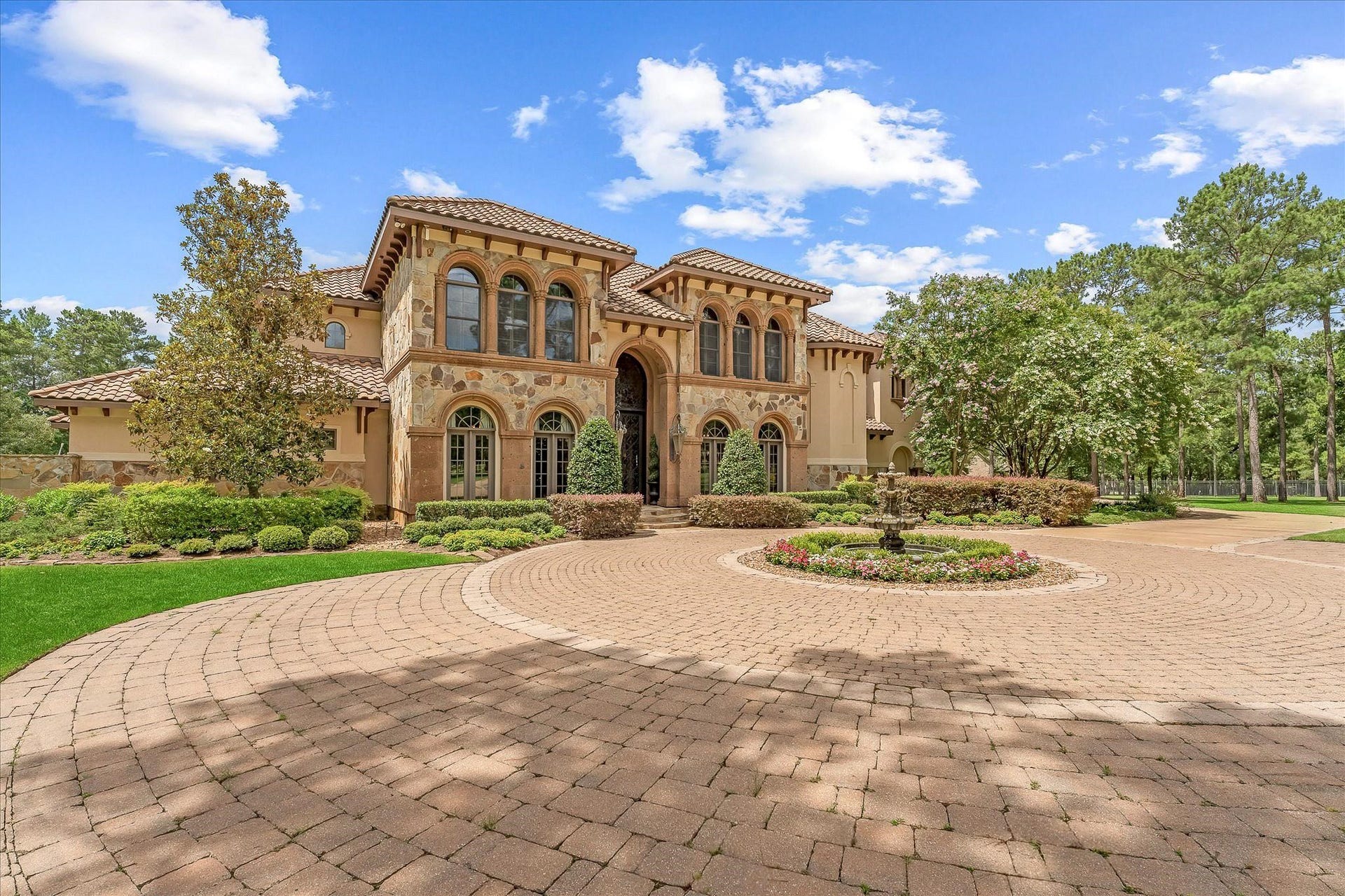 28322 Meadow Forest, Magnolia, TX 77355 Masterfully designed Mediterranean-style custom home features handcrafted finishes throughout. Situated on the green of Hole #1 at High Meadow Ranch Golf Course on just over 4 fully fenced & landscaped acres.