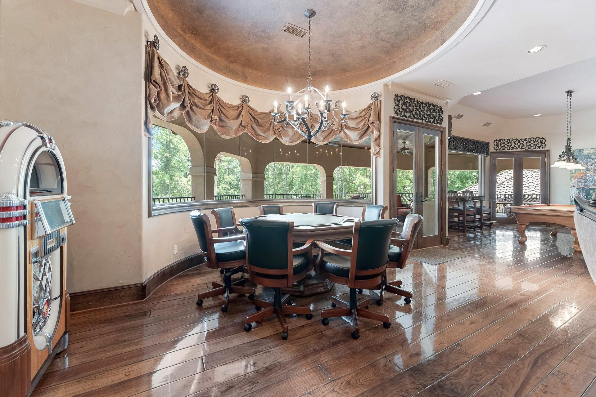 28322 Meadow Forest, Magnolia, TX 77355 Large Bay windows, frameless round bay windows provide southern exposure. Two dual exterior framed window doors lead out to a spacious private balcony area with views of the entire backyard and a spiral staircase for easy access to the backyard amenities.