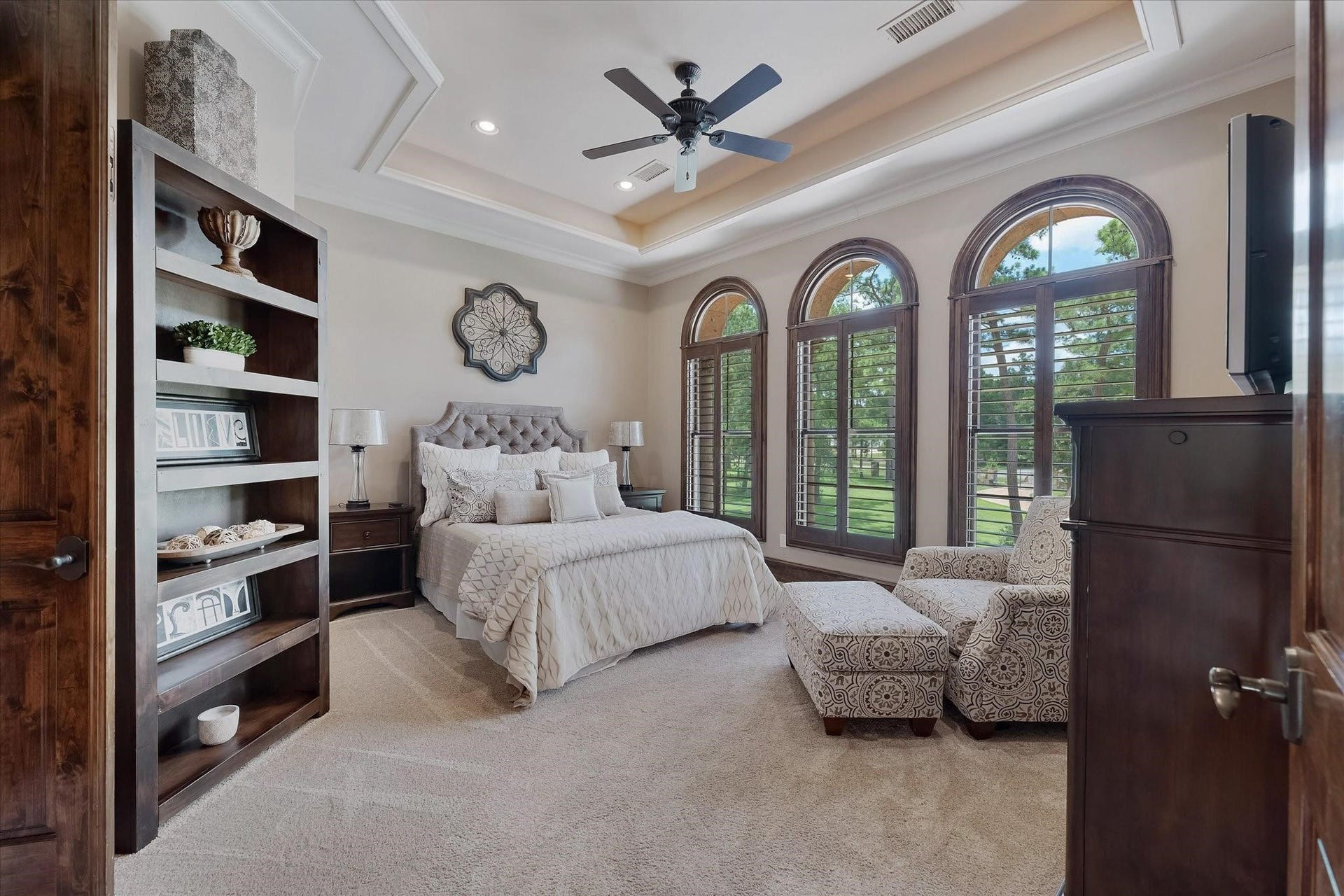 28322 Meadow Forest, Magnolia, TX 77355 Guest bedroom #1 on the 2nd floor. Dual Mahogany Door Entry and three large arched windows.