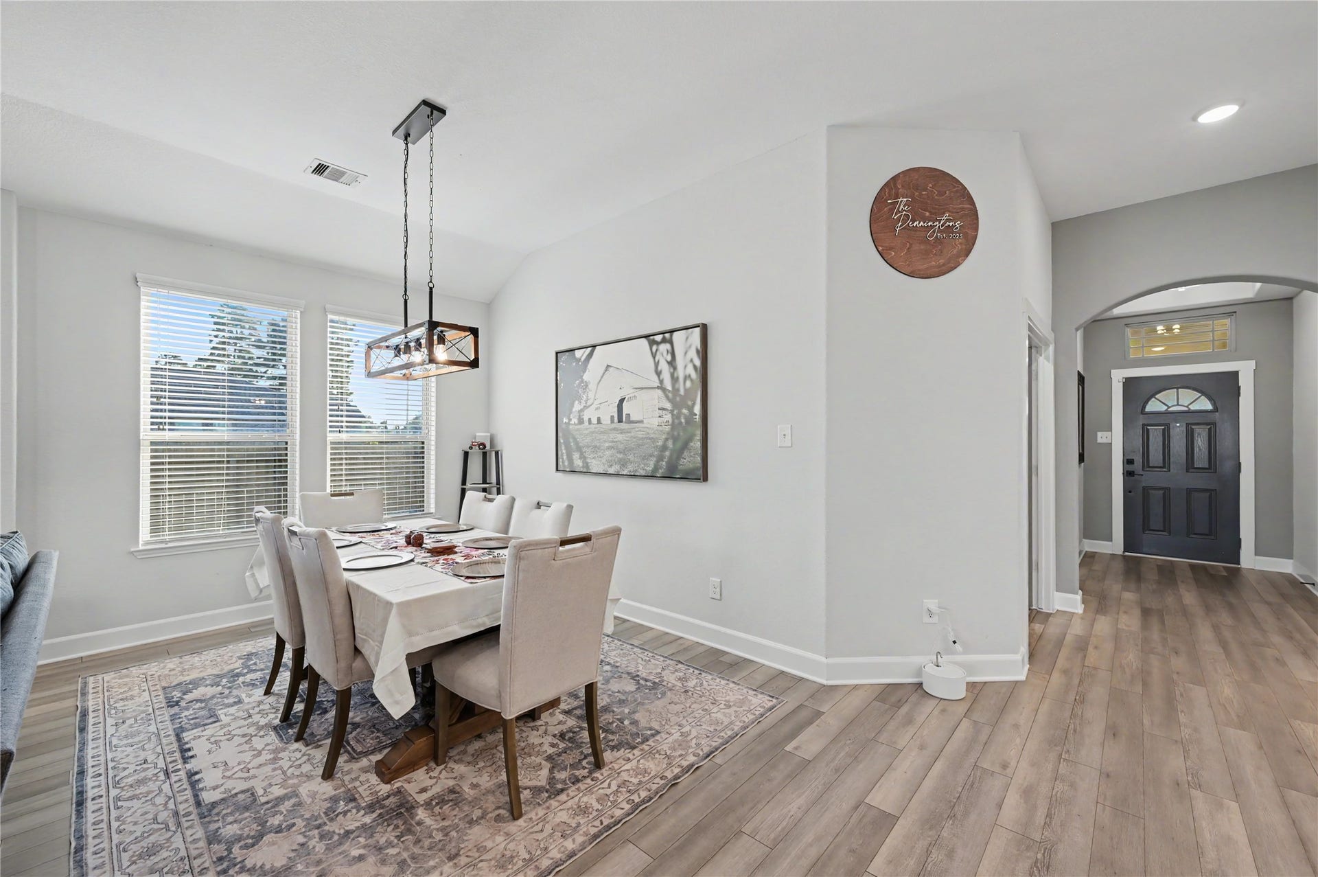 The bright and inviting dining area features beautiful flooring, elegant lighting, and a welcoming atmosphere. With convenient access to the surrounding living spaces, this area is ideal for everything from casual meals to memorable gatherings.