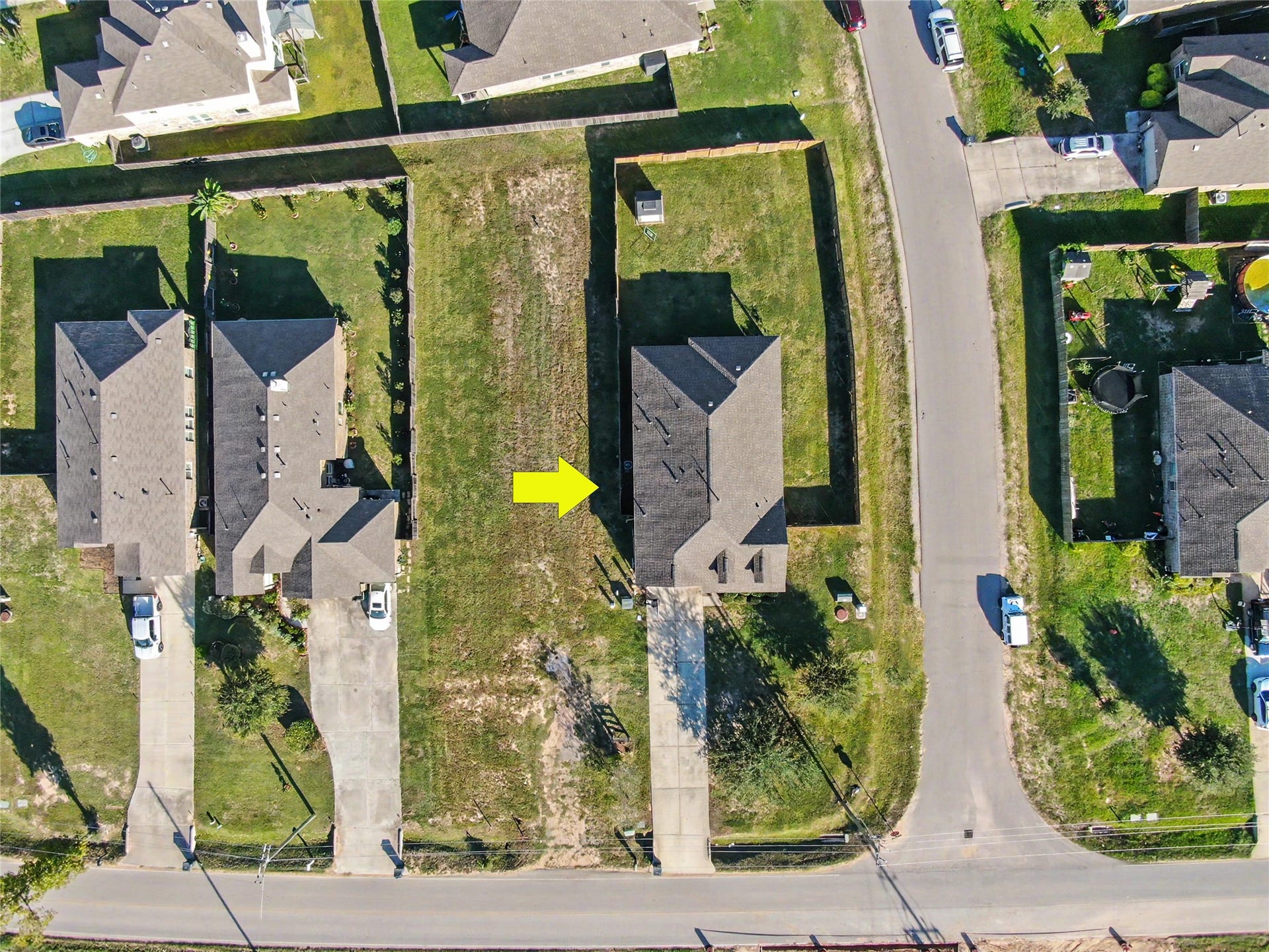 Bird's-eye view highlighting the property's placement within the surrounding neighborhood. This unique perspective offers a closer look at the lot configuration, neighboring properties, and overall residential setting.