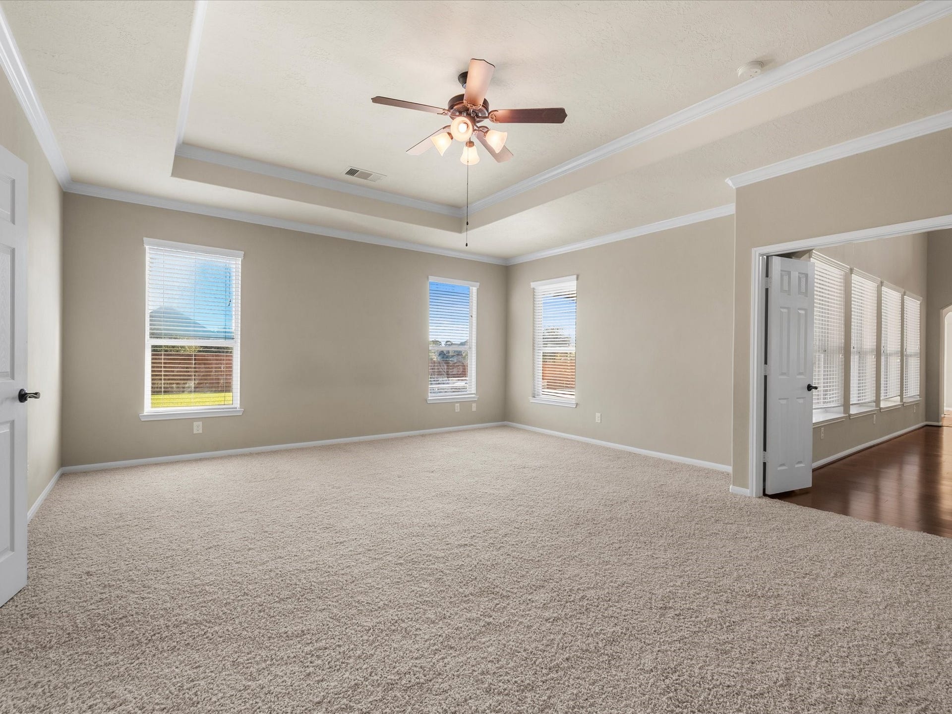 10458 Waterstone Estates Court, Tomball, TX 77375 Generous proportions and a peaceful atmosphere make the primary suite a welcome escape, with plenty of room to unwind, recharge, and enjoy a little space of your own.