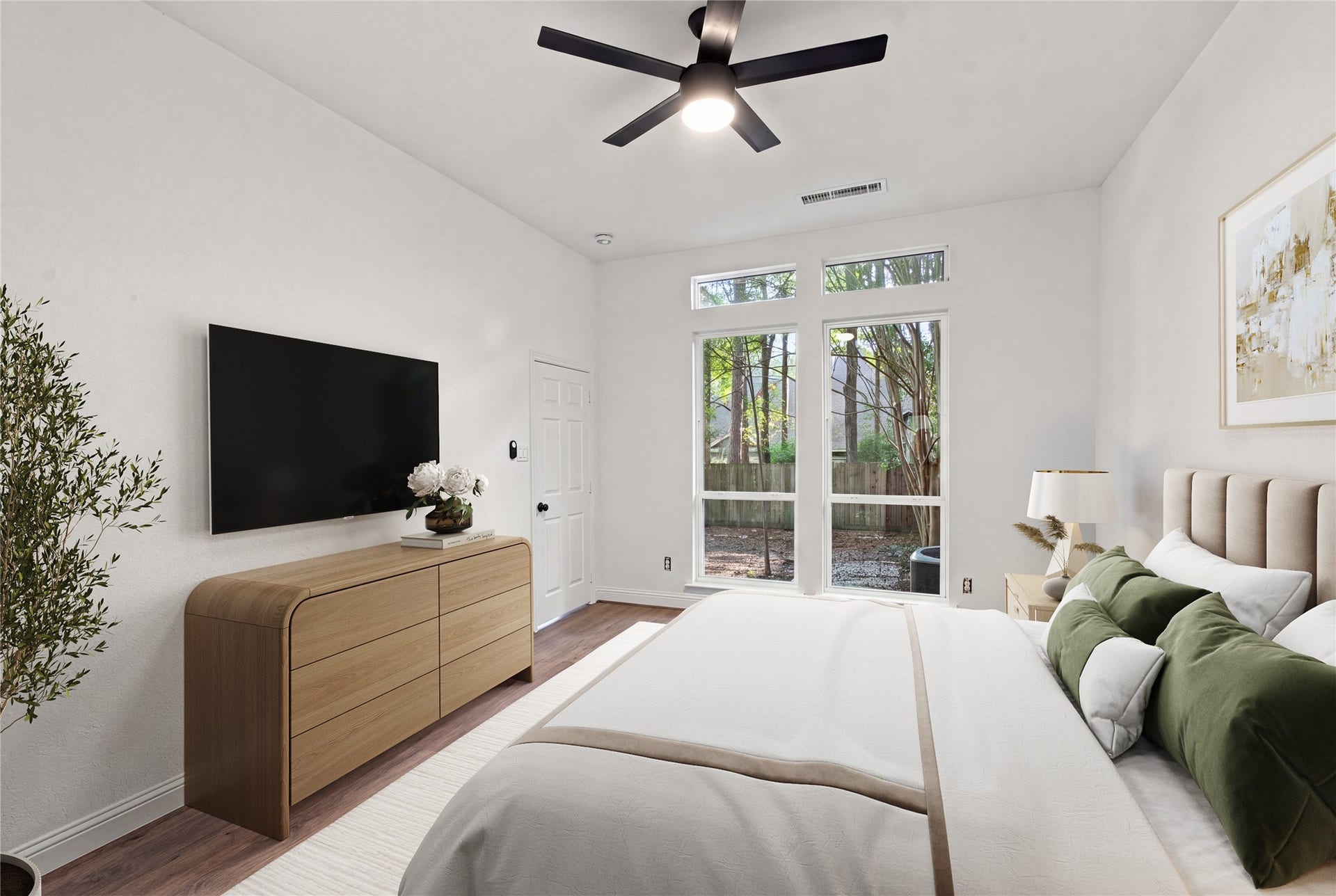47 Alderon Woods Place, Spring, TX 77382 Floor-to-ceiling windows bring plenty of natural light into the second bedroom. Virtually staged for layout purposes.