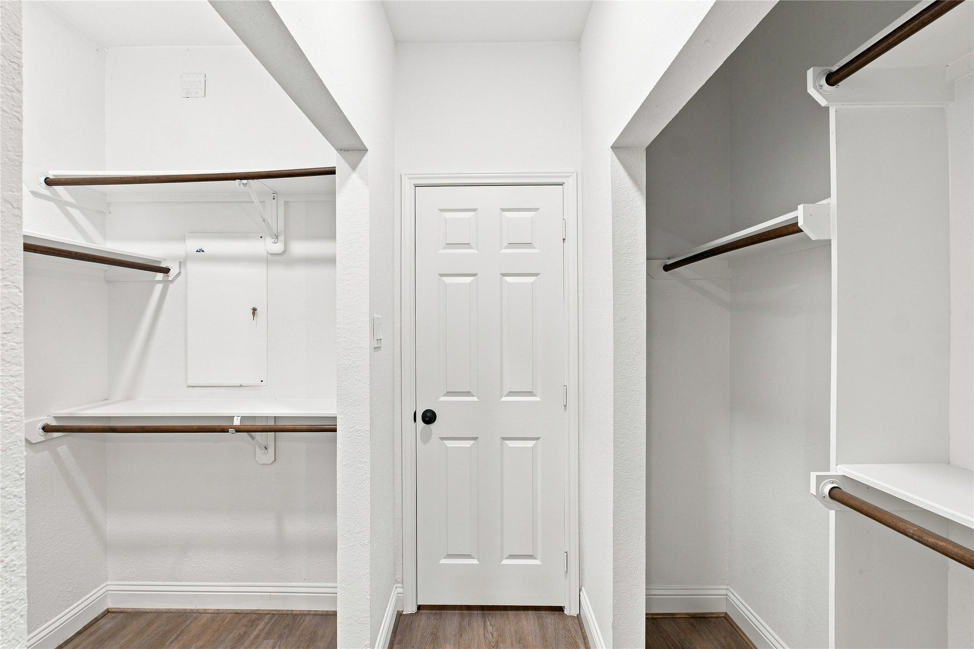 47 Alderon Woods Place, Spring, TX 77382 The primary walk-in closet offers multiple hanging areas and built-in shelving for organized storage.