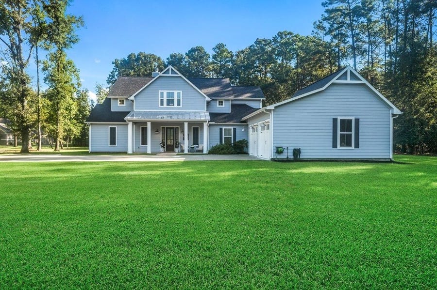 Property photo for 703 Lago Trace Drive, Huffman, TX