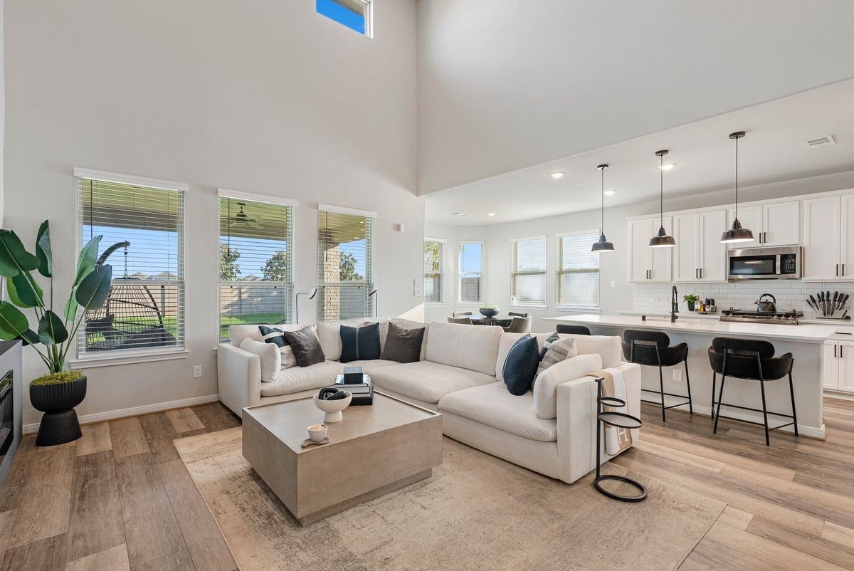 1702 Darwin Cedar Drive, Rosharon, TX 77583 This open and airy home has a sleek contemporary design! Graceful wood flooring flows throughout the first floor living areas!