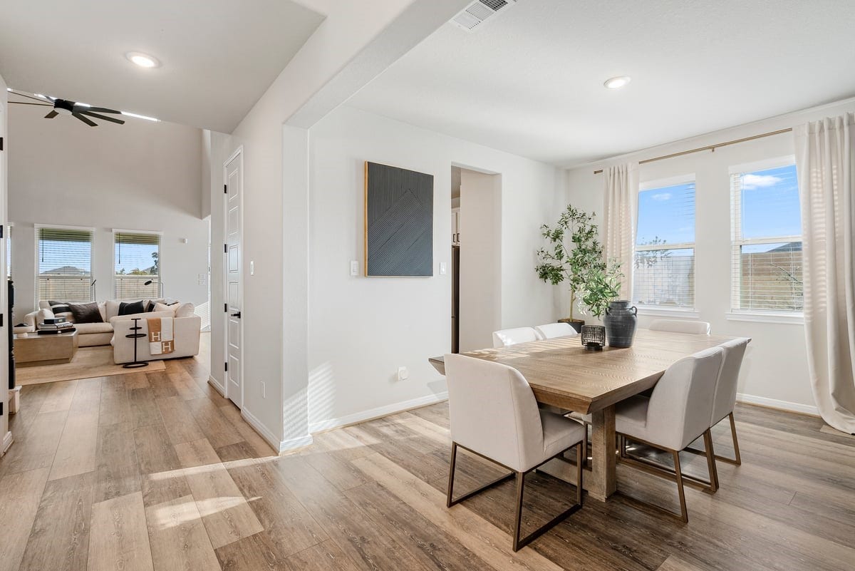 1702 Darwin Cedar Drive, Rosharon, TX 77583 Upgraded wood flooring invites you into the living room and kitchen!
