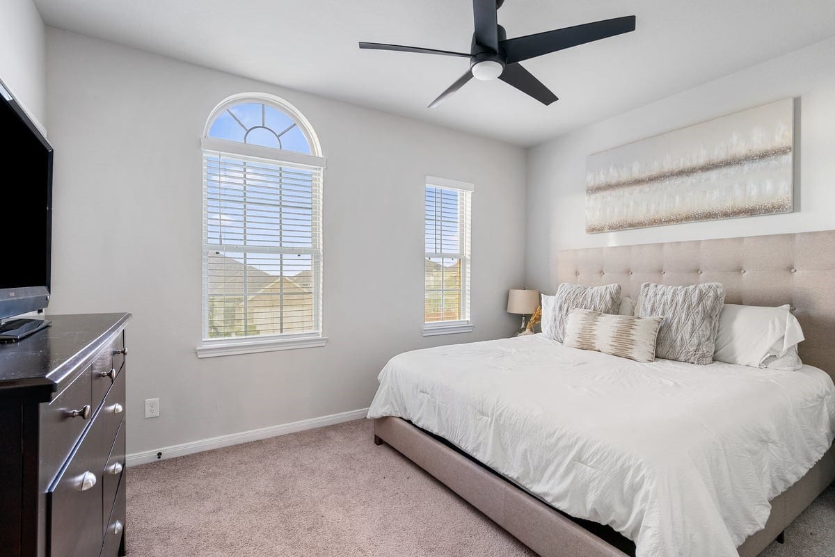 1702 Darwin Cedar Drive, Rosharon, TX 77583 Unique features are found throughout this home! Notice the beautiful arched windows in this spacious secondary bedroom!