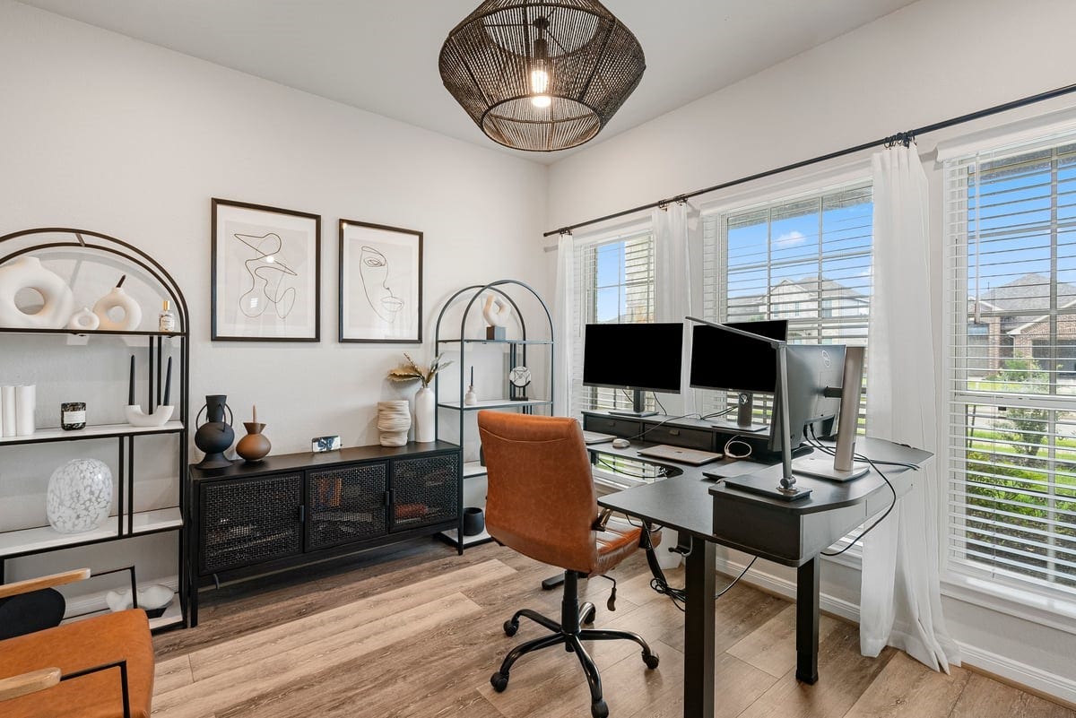 1702 Darwin Cedar Drive, Rosharon, TX 77583 The private office is conveniently located at the front of the home, and offers picturesque views into the front yard! Updated light fixture provide a stylish touch!