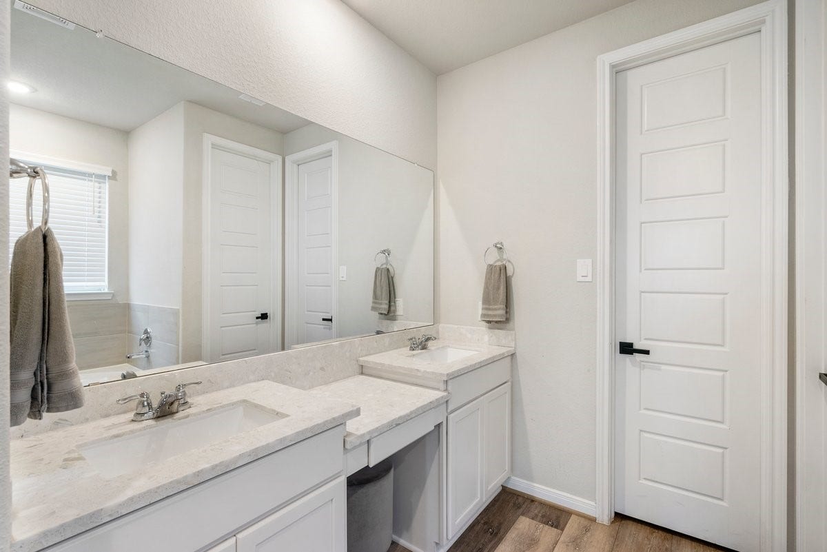 1702 Darwin Cedar Drive, Rosharon, TX 77583 Double sinks and extended vanity provide great storage space for all your personal items!