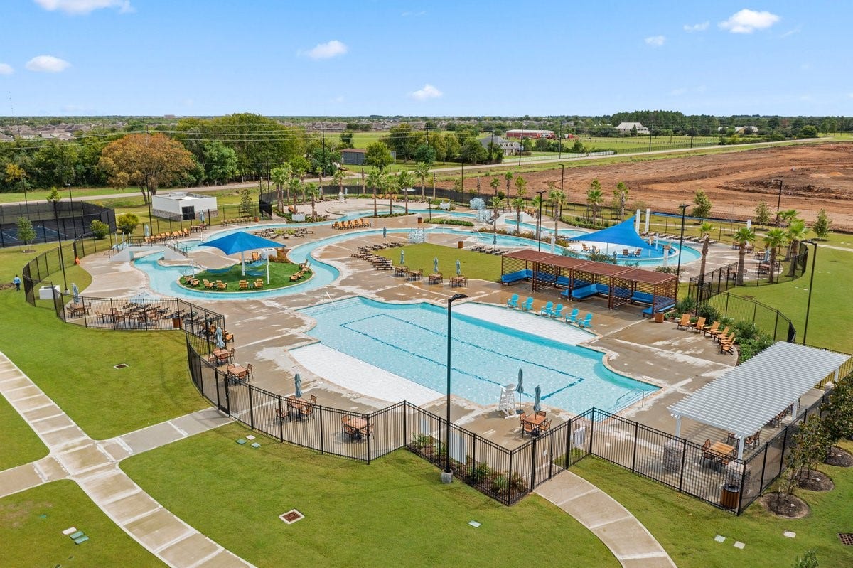 1702 Darwin Cedar Drive, Rosharon, TX 77583 Nestled in the vibrant master planned community of Sierra Vista, this home is moments away from the amenities center! Enjoy laps around the lazy river, tennis and pickleball courts, and much more!