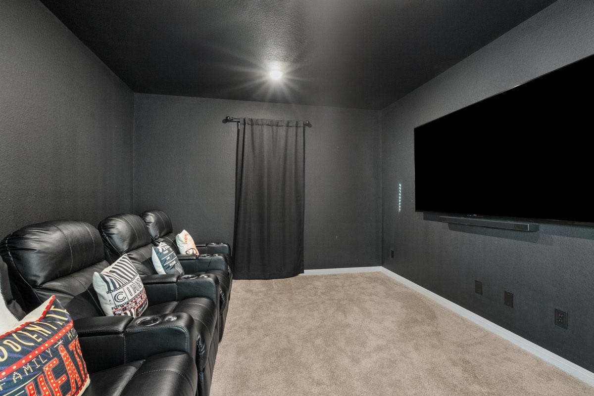 1702 Darwin Cedar Drive, Rosharon, TX 77583 Movie nights and game days are a blast in this dedicated media room!