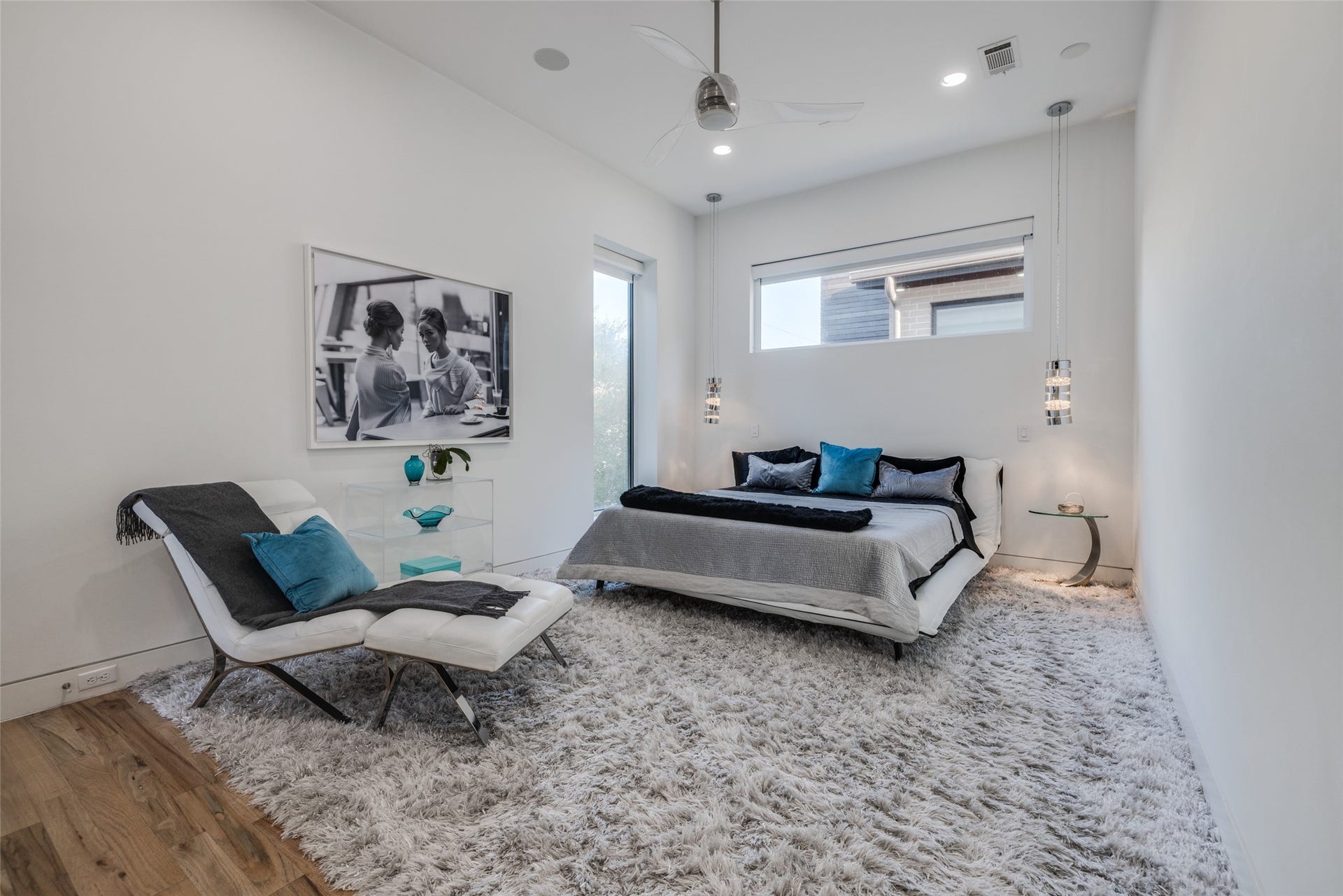 2014 Park Street, Houston, TX 77019 Primary Bedroom with designer carpet & wood flooring, custom motorized blackout shades, dual designer pendant bedside lights, fan, recessed LED lighting, sitting area & access to balcony & coffee bar, lots of closets & storage, in ceiling speakers