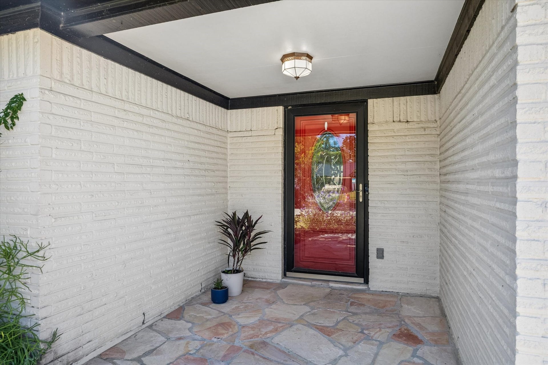 15726 Blackhawk Boulevard, Friendswood, TX 77546 Covered slate front porch.