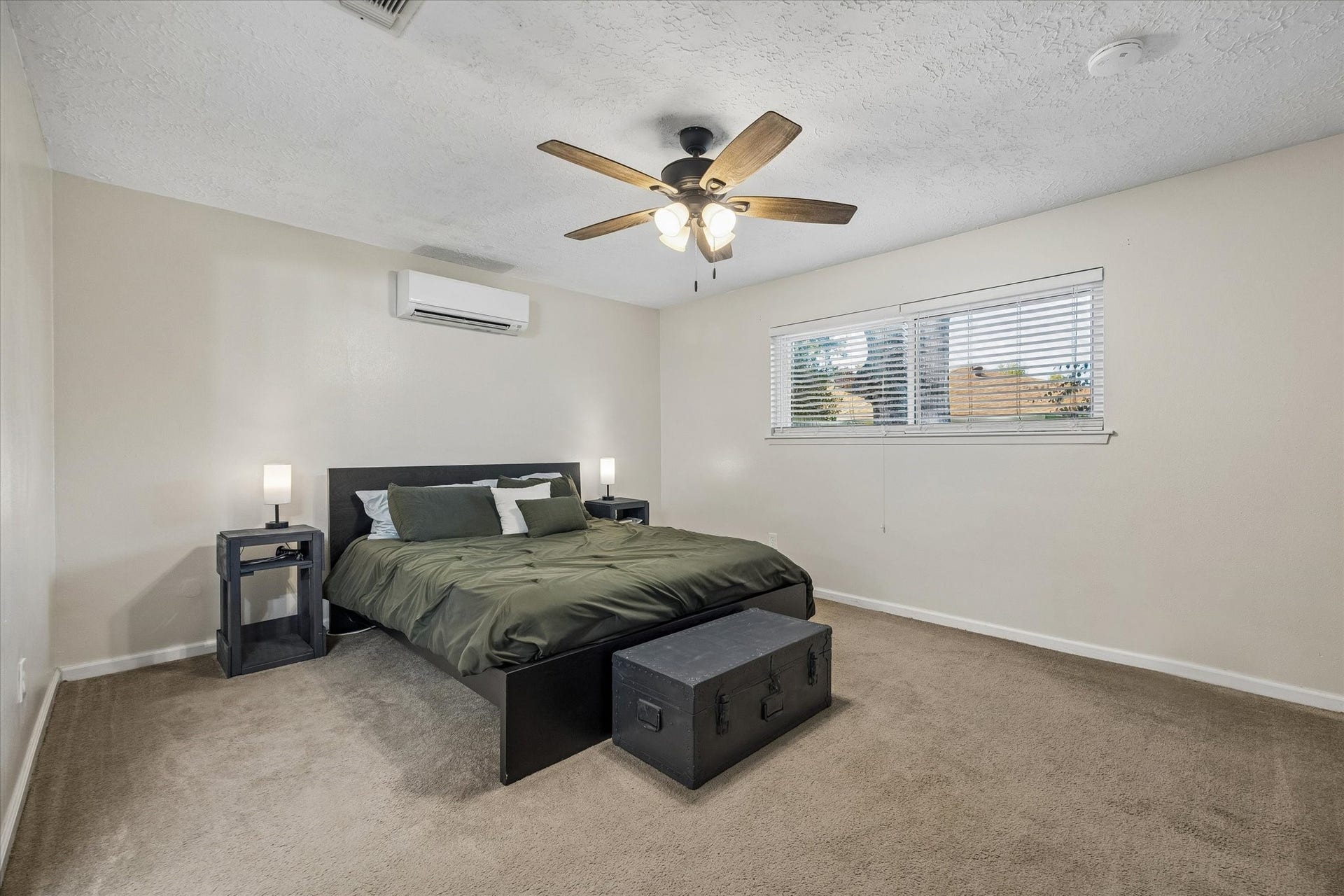 15726 Blackhawk Boulevard, Friendswood, TX 77546 Large primary bedroom with neutral colors & ceiling fan
