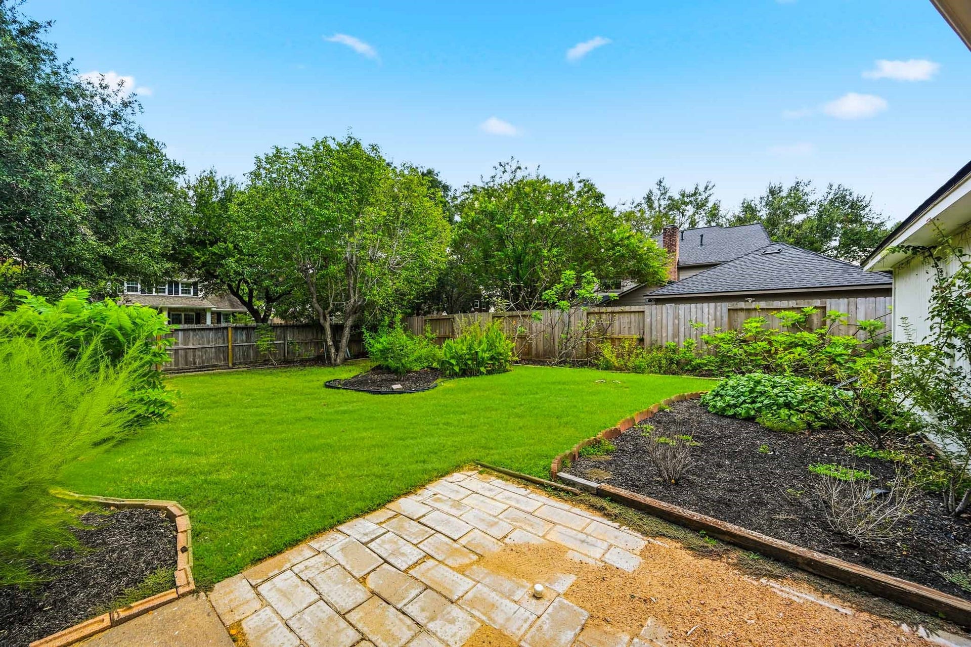 3926 Felicia Drive, Sugar Land, TX 77479 Spacious backyard with patio area and plenty of room to garden.