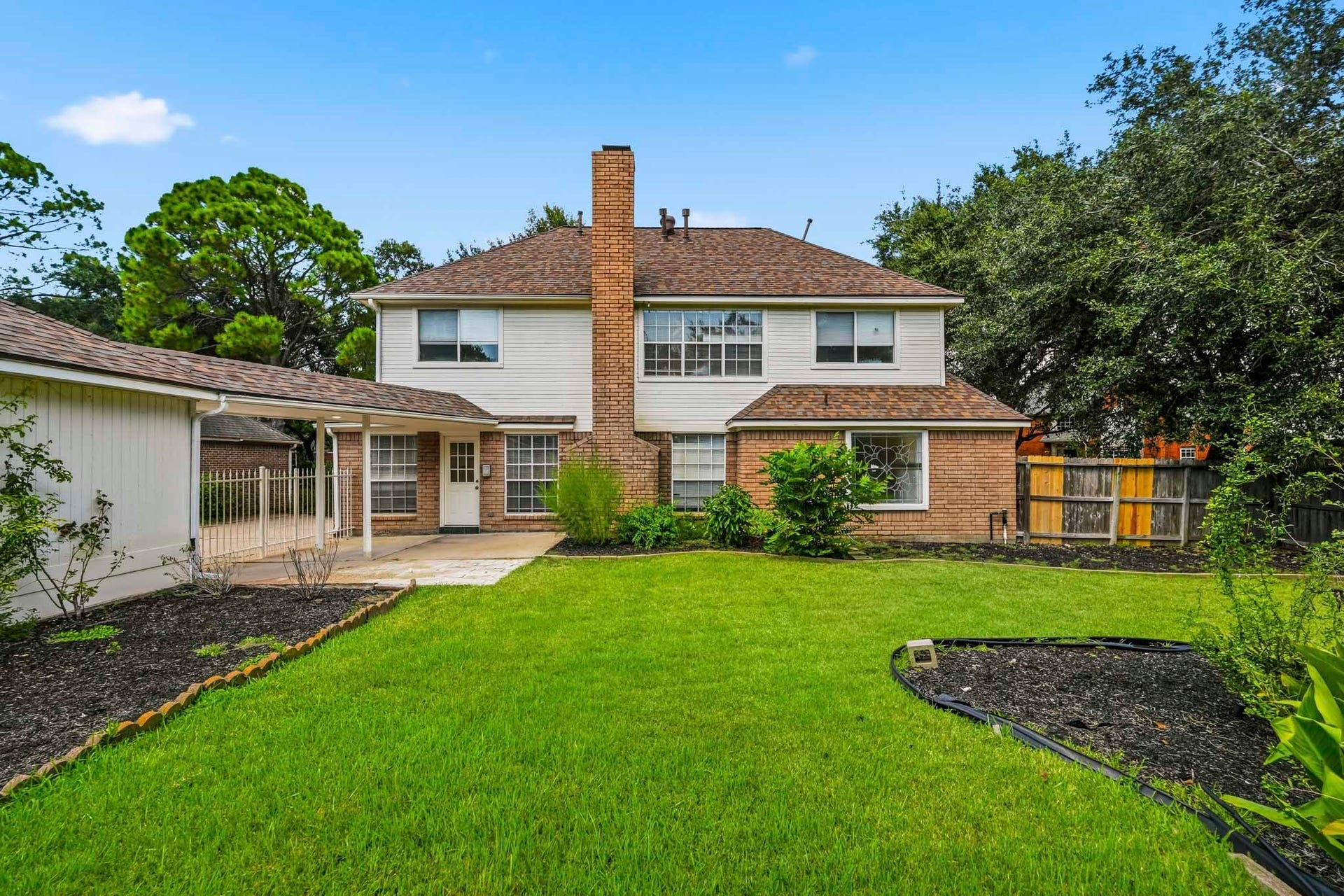 3926 Felicia Drive, Sugar Land, TX 77479 Large, private backyard with mature landscaping and plenty of room for outdoor living and play.