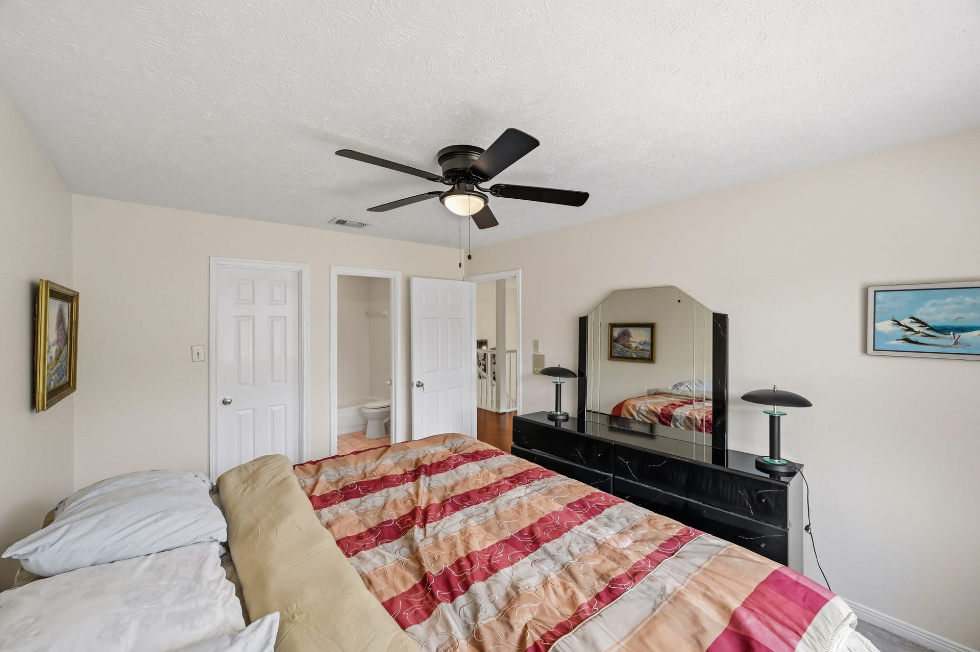 3926 Felicia Drive, Sugar Land, TX 77479 Another view of the secondary bedroom with nearby bath and closet access.