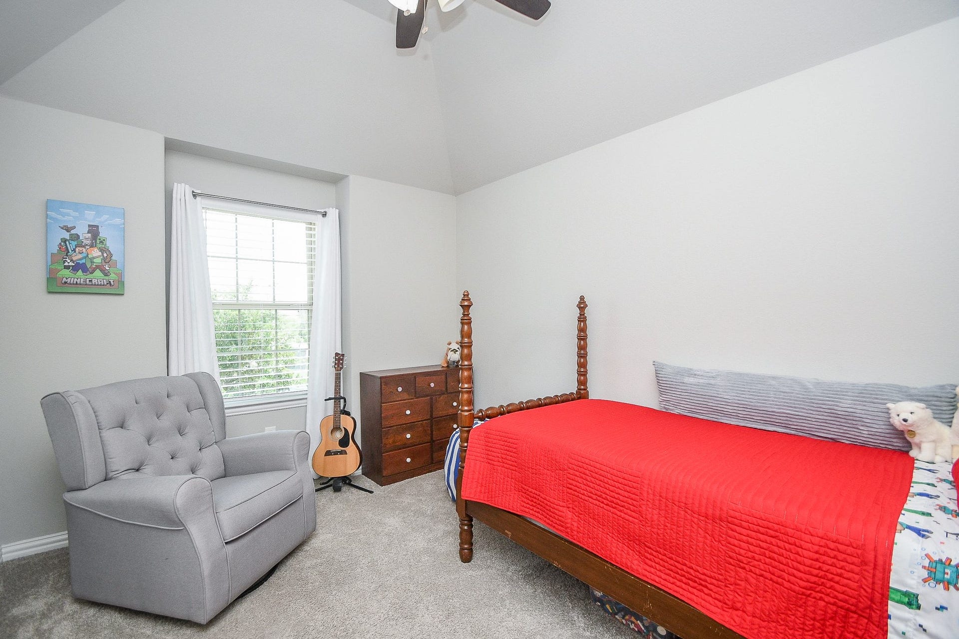 2703 Ripe Amber Cup Court, Richmond, TX 77406 Upstairs secondary bedroom with high ceiling, window view and convenient access to the nearby bath.