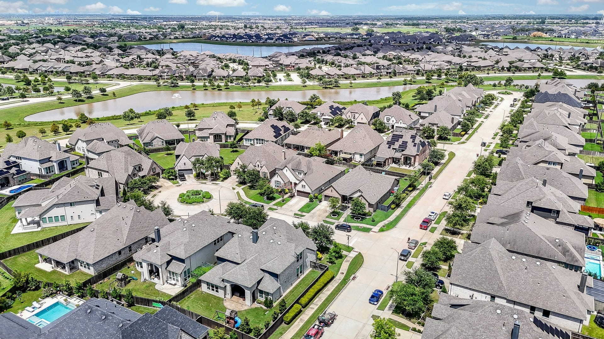 2703 Ripe Amber Cup Court, Richmond, TX 77406 Aerial neighborhood view showing the homes corner lot setting and surrounding residential streets.