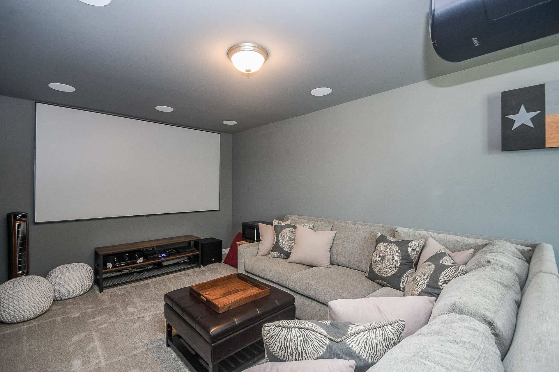 2703 Ripe Amber Cup Court, Richmond, TX 77406 Media room located off the game room with projector, screen and built-in surround sound speakers.