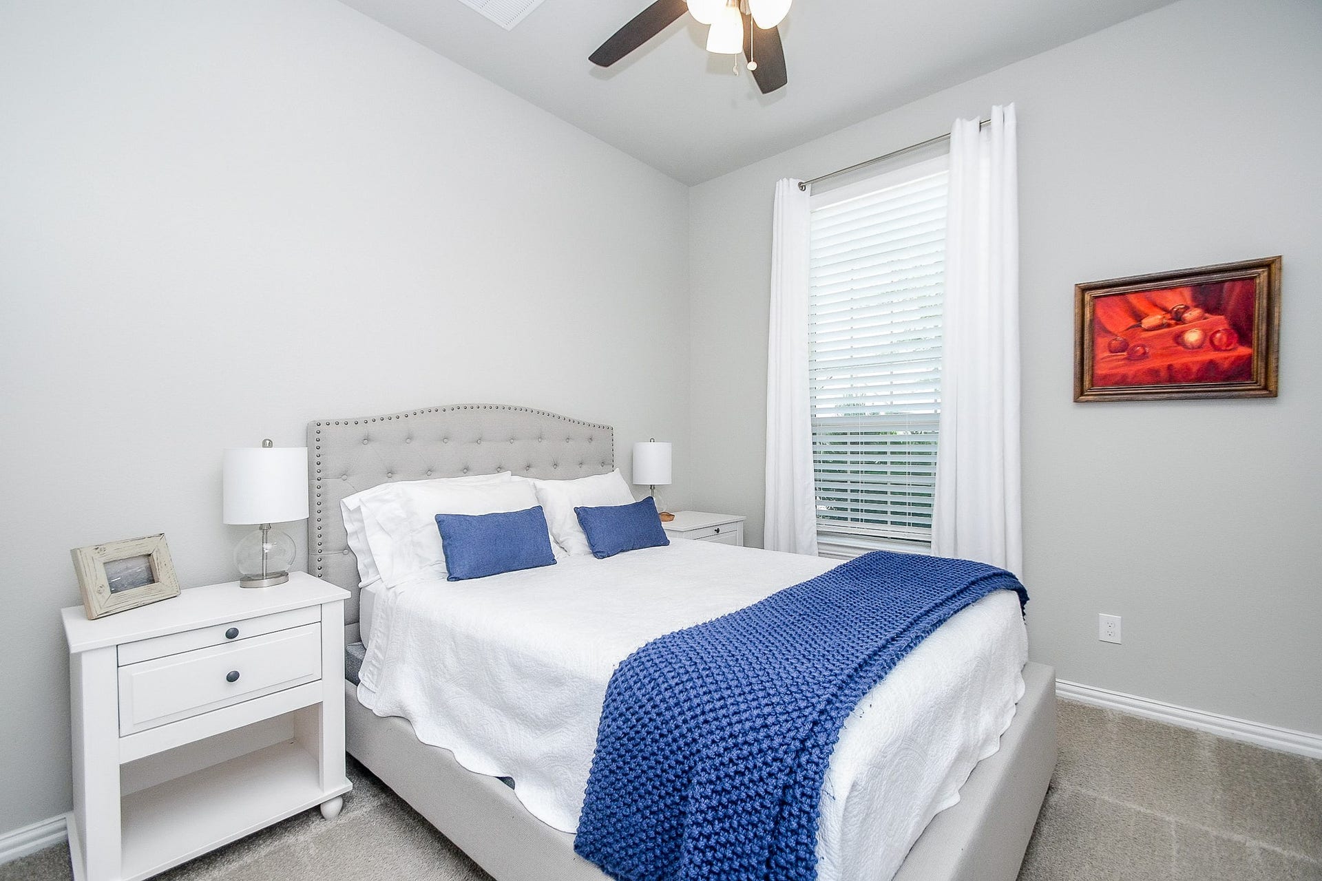 2703 Ripe Amber Cup Court, Richmond, TX 77406 Secondary bedroom on the first floor with window view and convenient access to the nearby full bath.