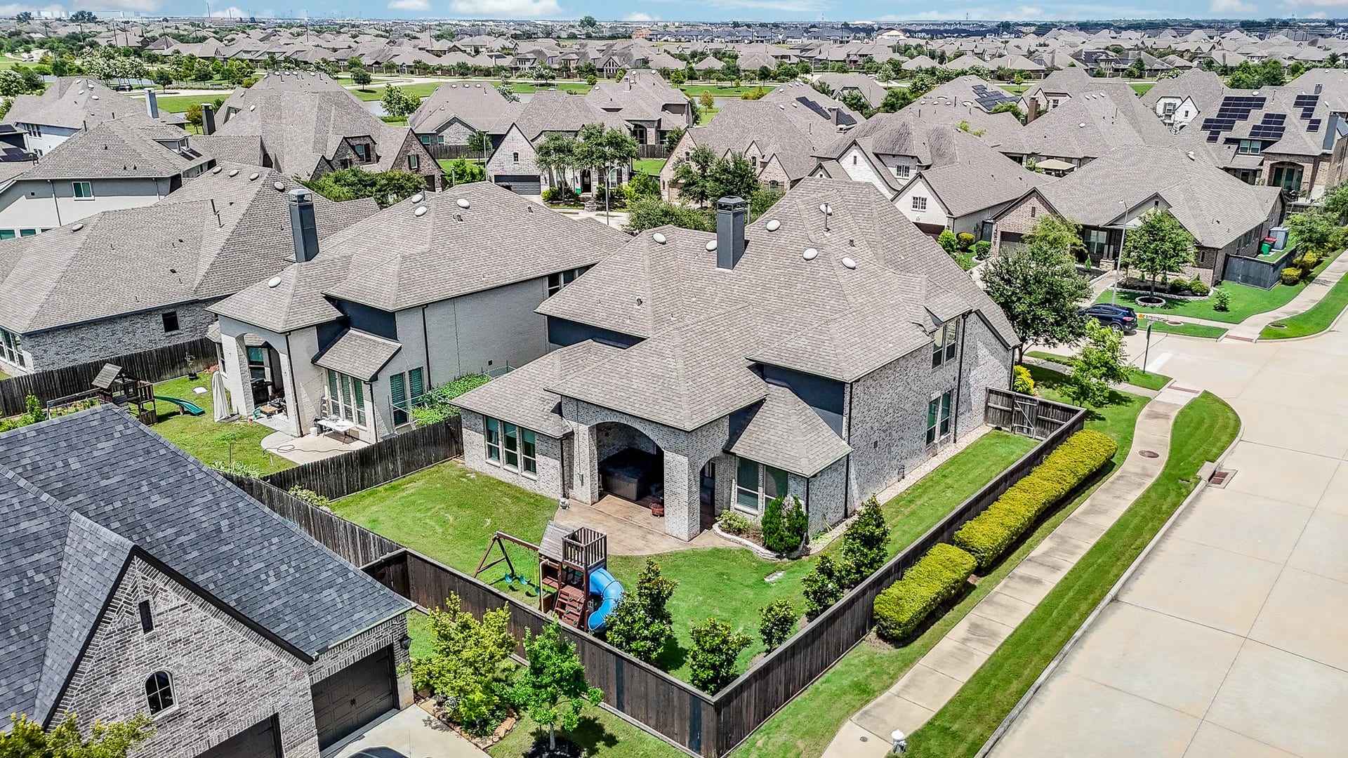 2703 Ripe Amber Cup Court, Richmond, TX 77406 Overhead exterior view shows the fenced backyard, side yard space and placement of the home on the lot.