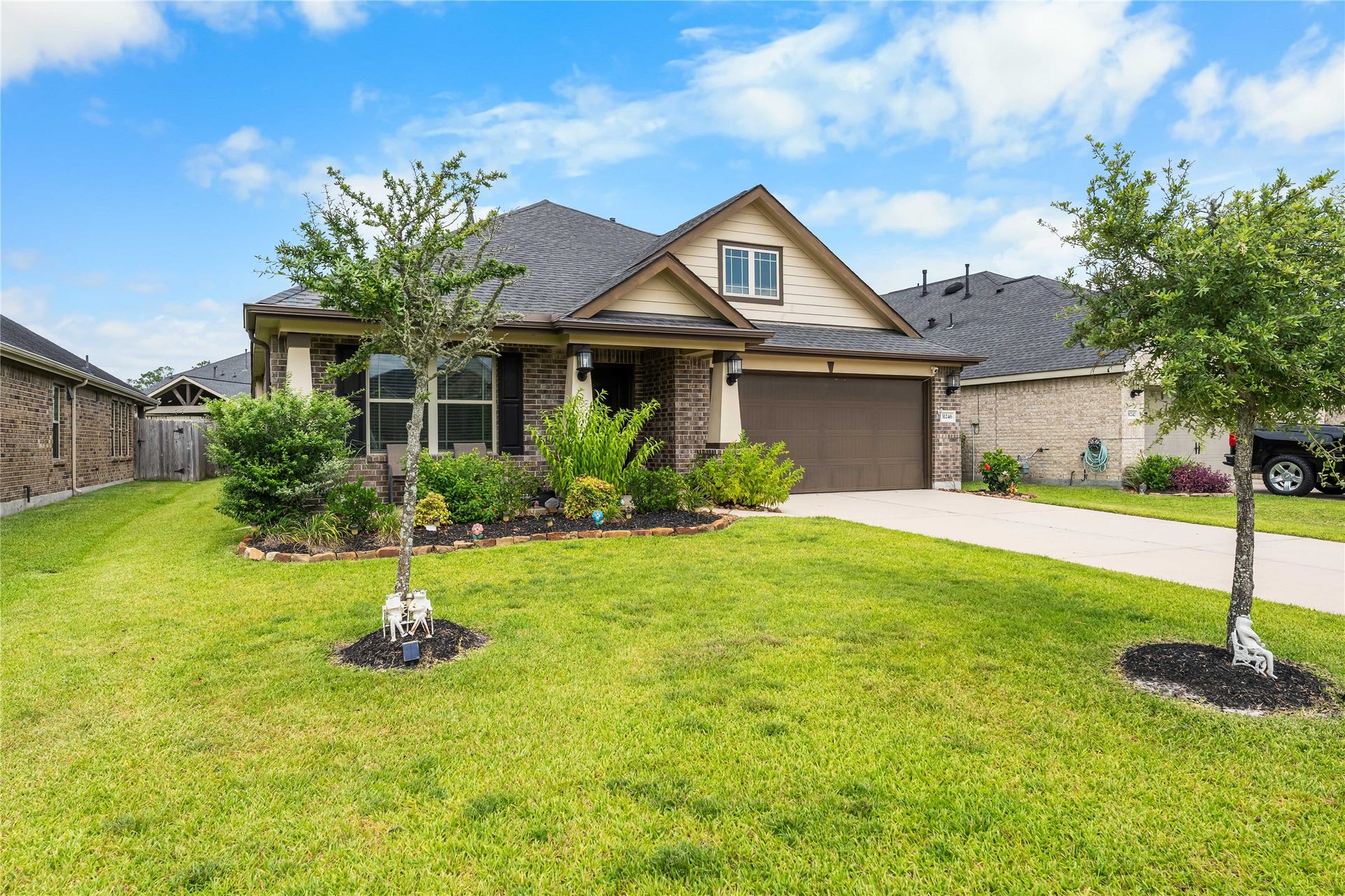 Welcome home to 31246 Liberty Knoll, where timeless curb appeal, a manicured lawn, and a welcoming front elevation create an inviting first impression in the highly sought-after Falls at Imperial Oaks.