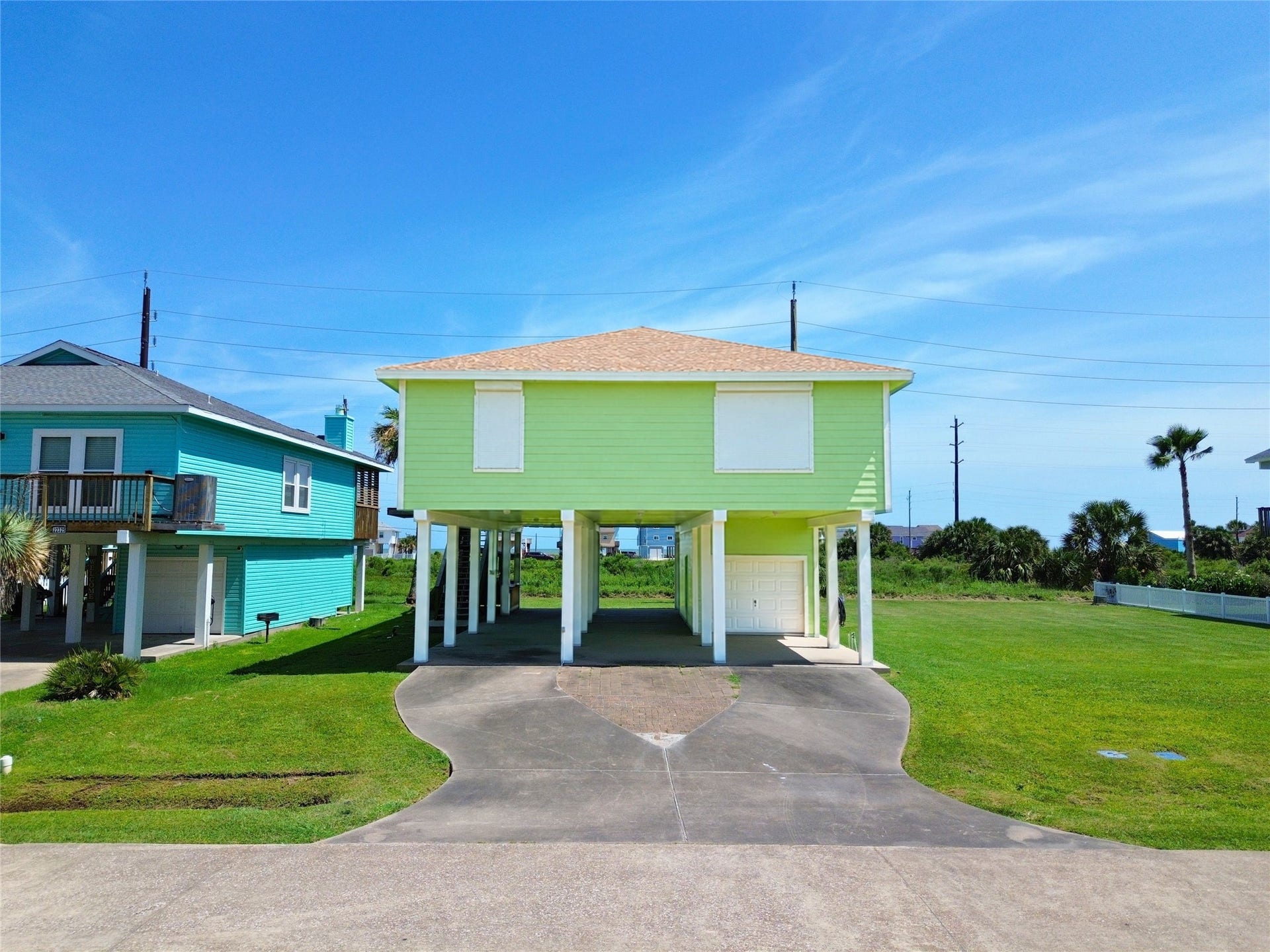 22329 Vista Del Mar, Galveston, TX 77554 Storm shutters can be found on every window and door on the main level.