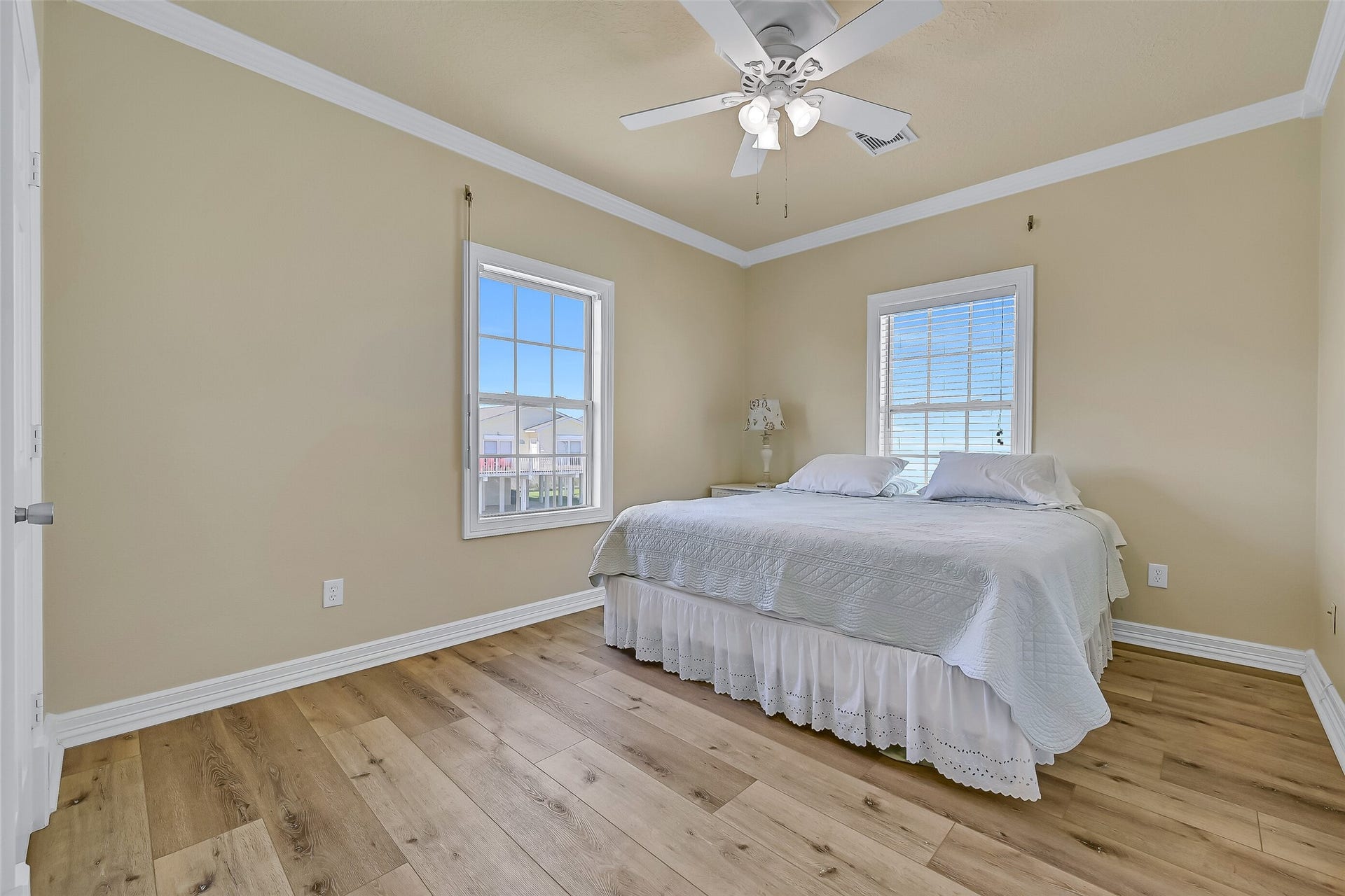 22329 Vista Del Mar, Galveston, TX 77554 Down the hall you will find the second guest bedroom that currently hosts a king bed.